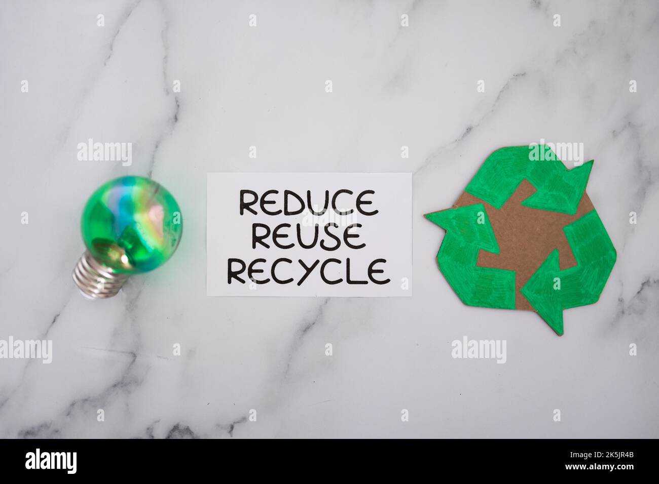reduce reuse recycle sign with green light bulb and recycle icon ...