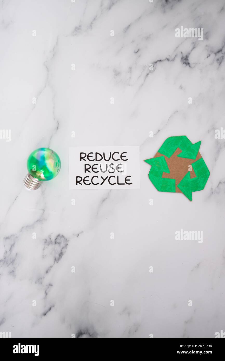 reduce reuse recycle sign with green light bulb and recycle icon ...