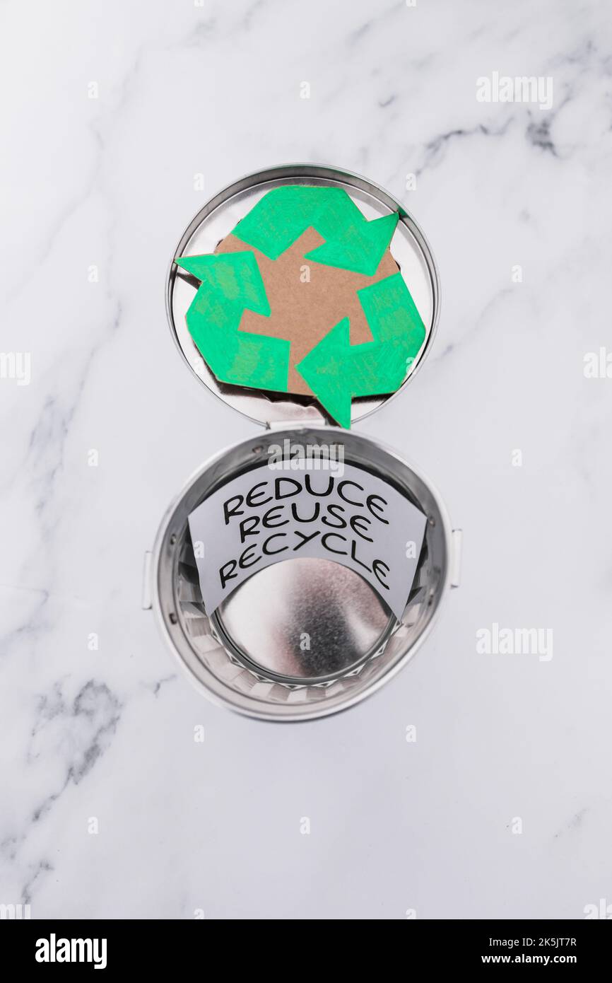 reduce reuse recycle sign with mini trash can and recycle icon, concept ...