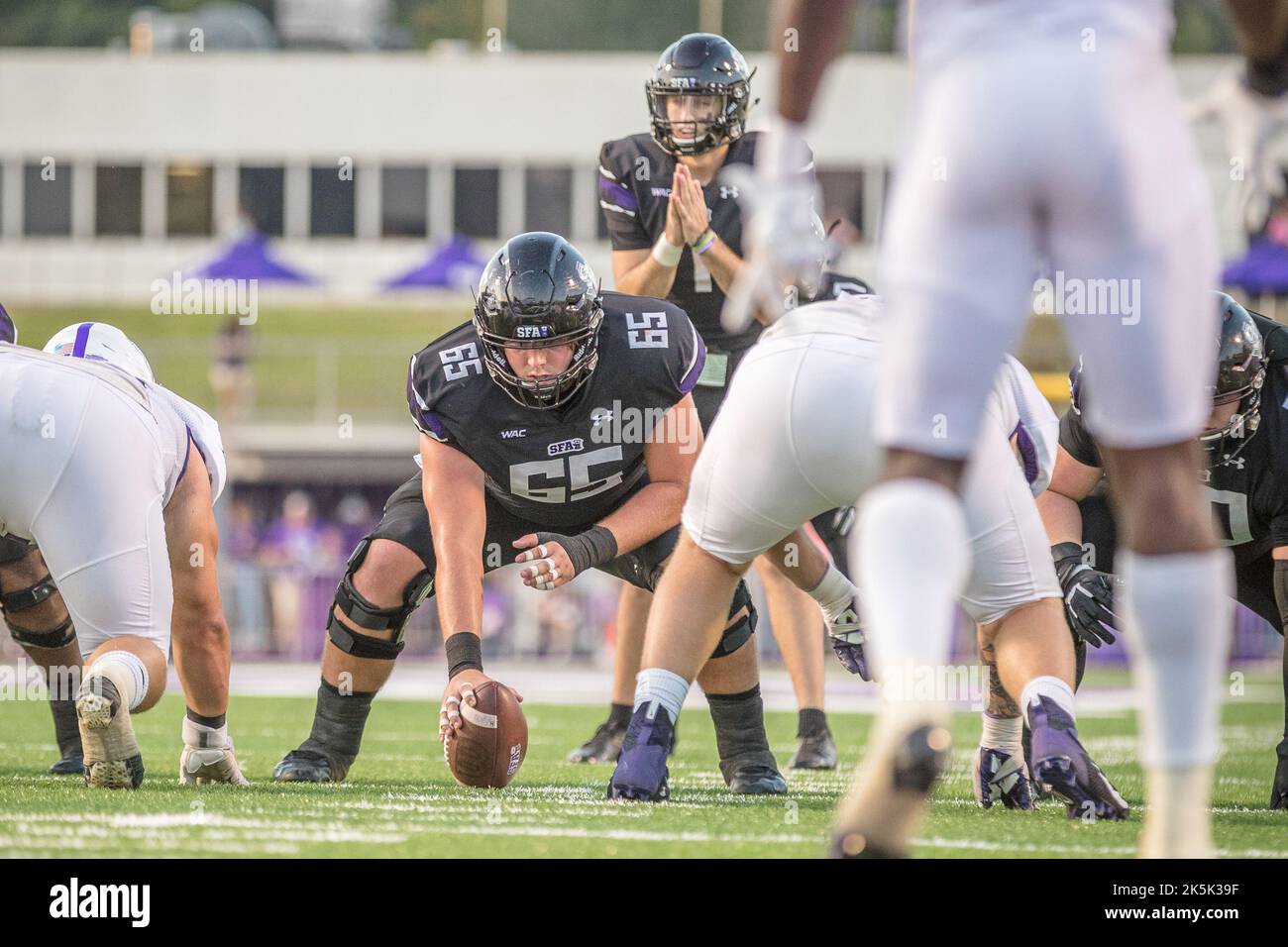 October 8, 2022: Stephen F. Austin Lumberjacks offensive lineman Clint Lapic (65) prepares to snap the ball to quarterback Trae Self (1) during the NCAA football game between the Abilene Christian Wildcats and the Stephen F. Austin Lumberjacks at Homer Bryce Stadium in Nacogdoches, Texas. Prentice C. James/CSM Stock Photo