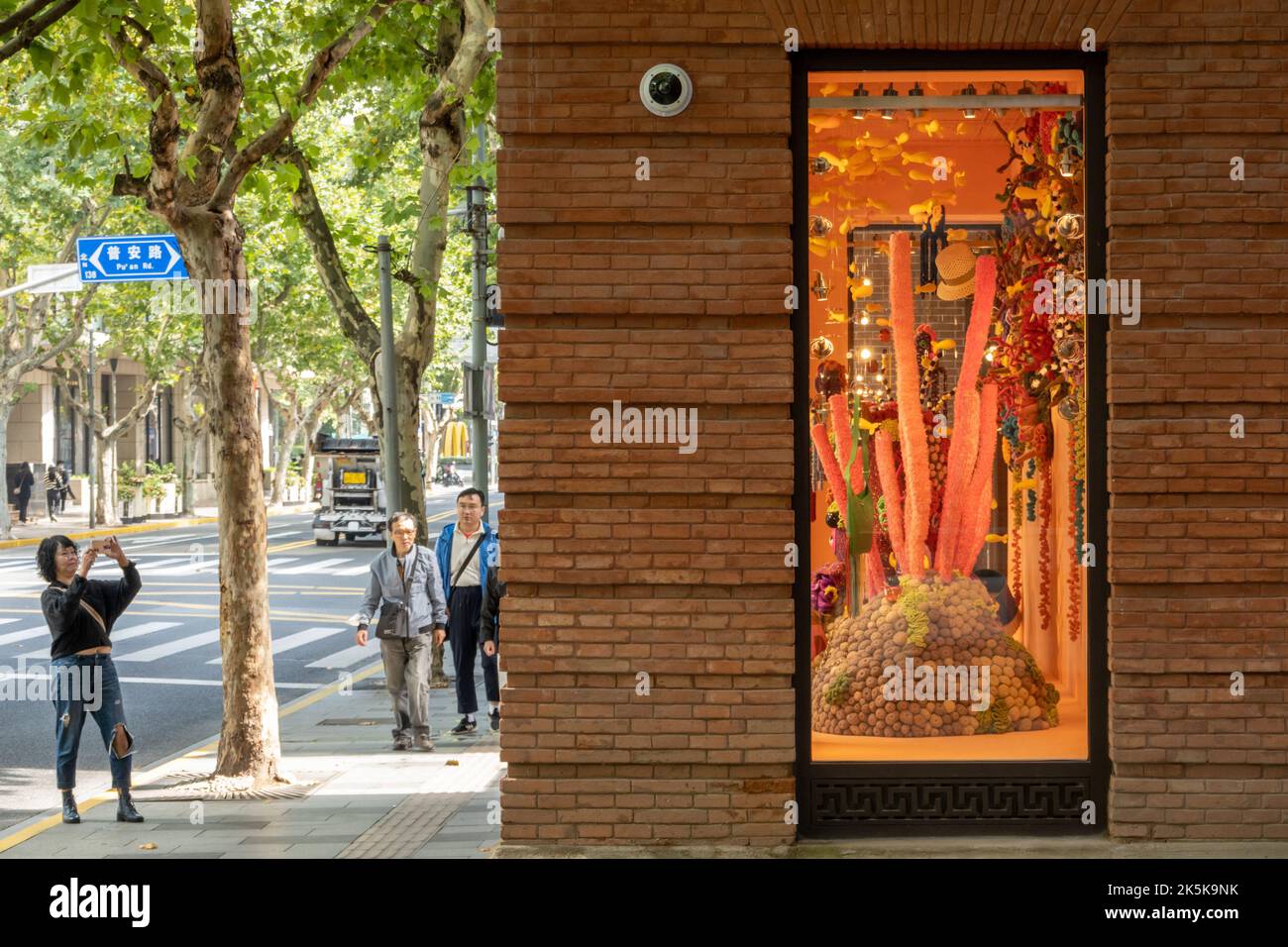 SHANGHAI, CHINA - OCTOBER 9, 2022 - A window display at a Hermes store ...