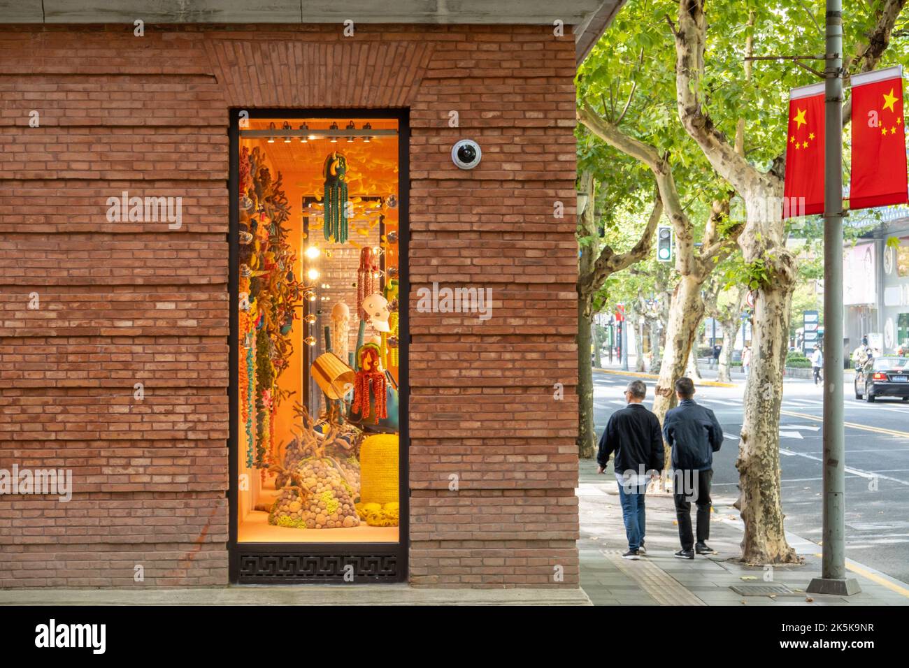 SHANGHAI, CHINA - OCTOBER 9, 2022 - A window display at a Hermes store ...