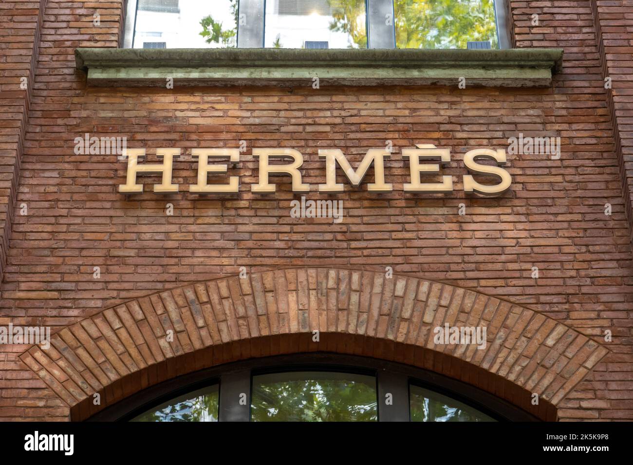SHANGHAI, CHINA - OCTOBER 9, 2022 - A window display at a Hermes store ...