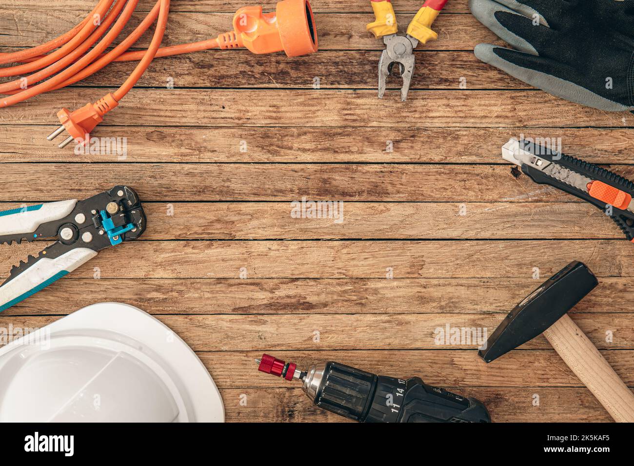 Flat lay composition with different construction tools on wooden background. Stock Photo