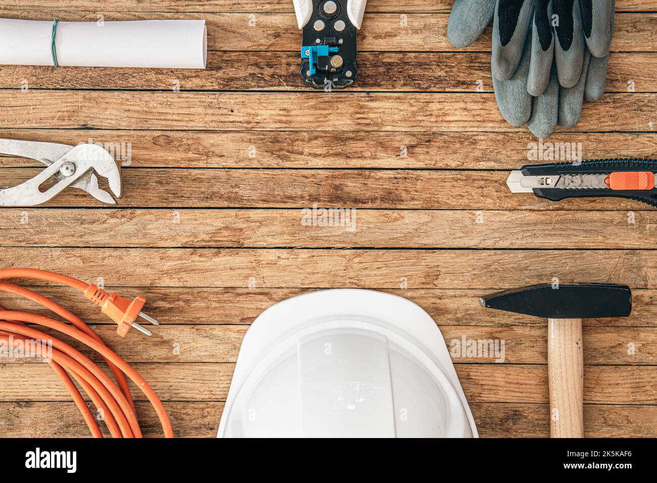 Flat lay composition with different construction tools on wooden background. Stock Photo