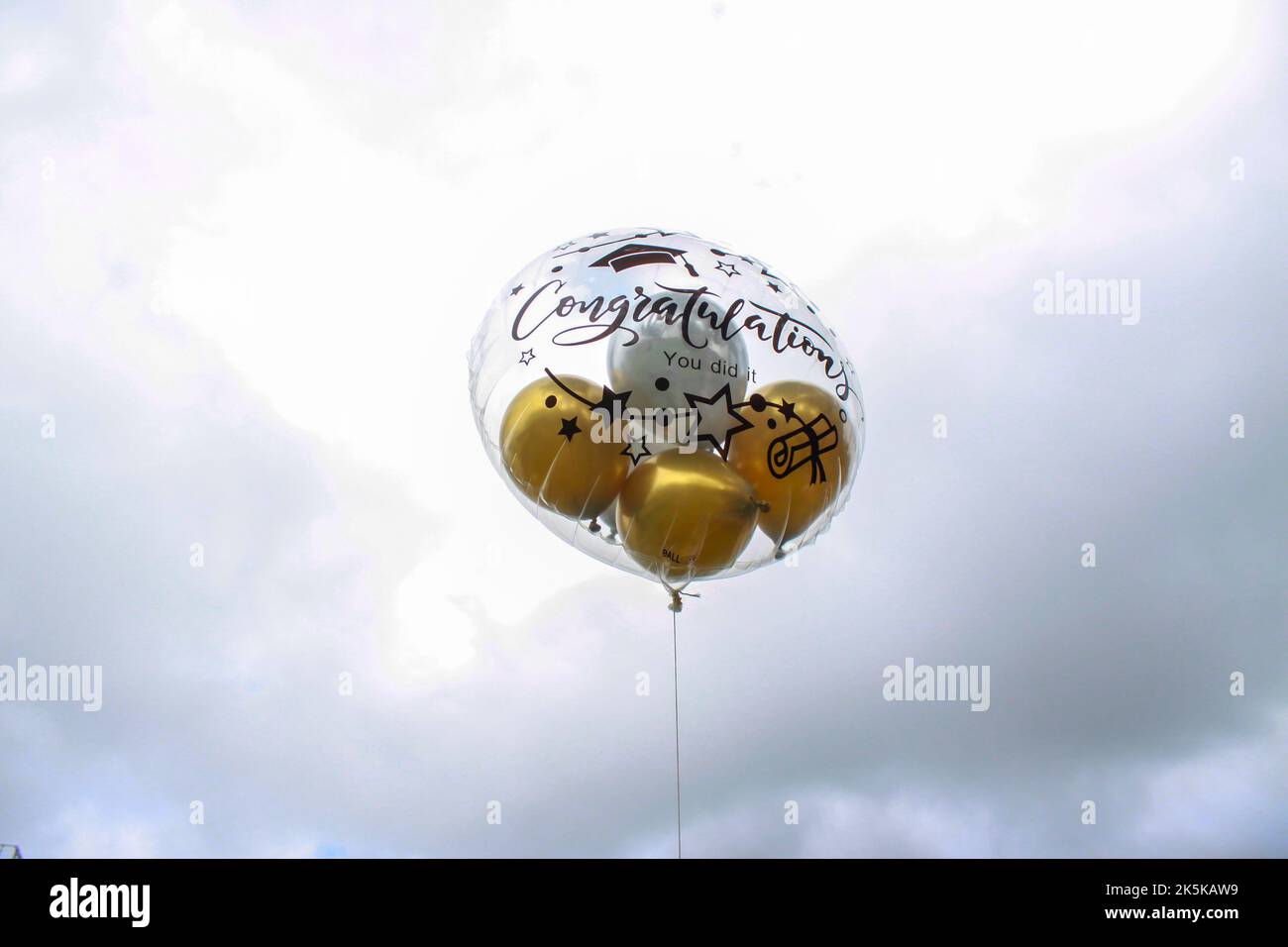 Graduation balloons are used to congratulate graduates. Stock Photo