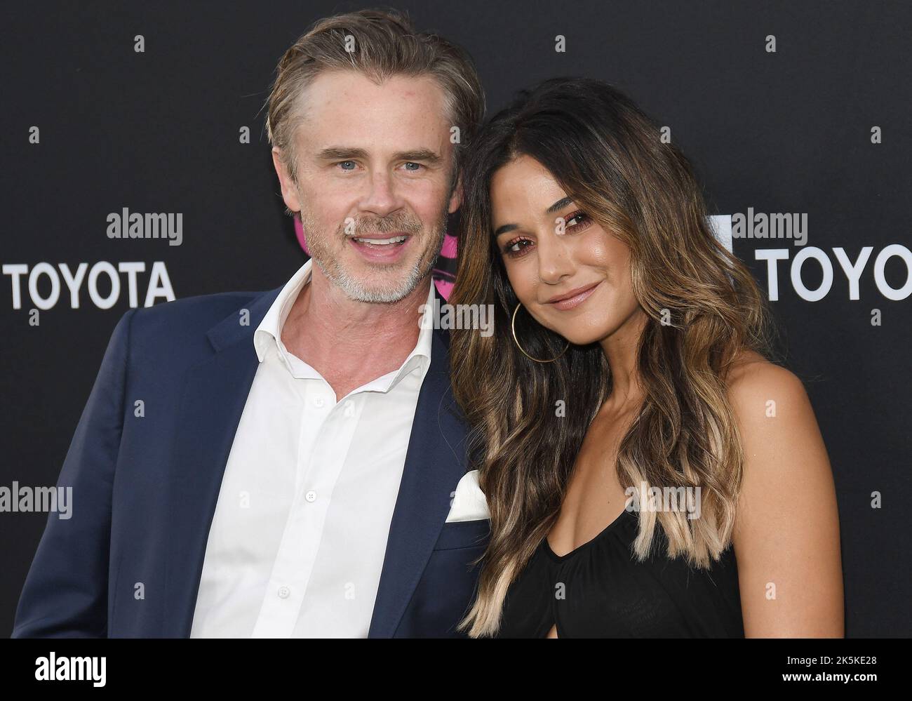 (LR) Sam Trammell and Emmanuelle Chriqui at the 2022 Environmental