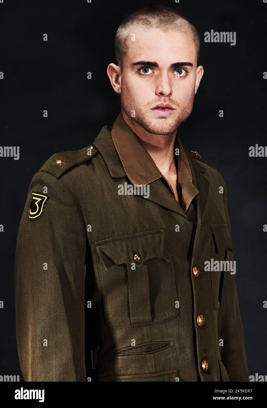 To serve and protect. Portrait of a young man in a military uniform Stock Photo Alamy