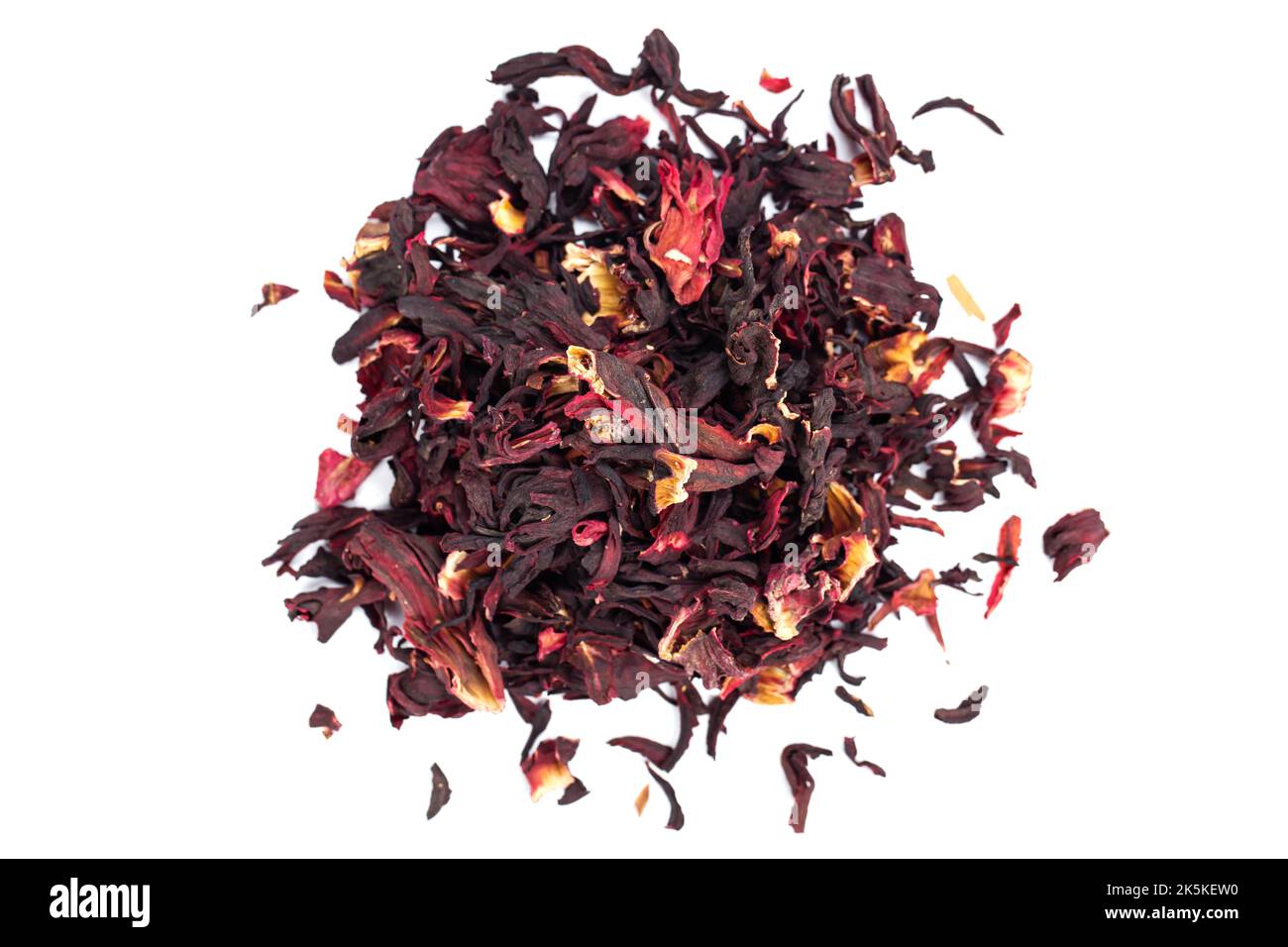 Karkade tea.  Bunch of dry hibiscus tea isolated on white background, top view Stock Photo