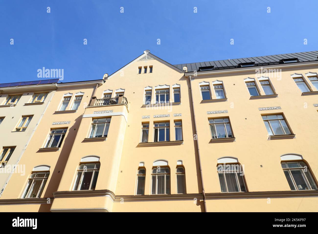 Low angle view of multi story residential buildings facades. Stock Photo