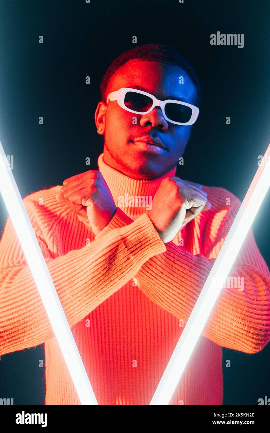 cyberpunk hero futuristic portrait man neon light Stock Photo