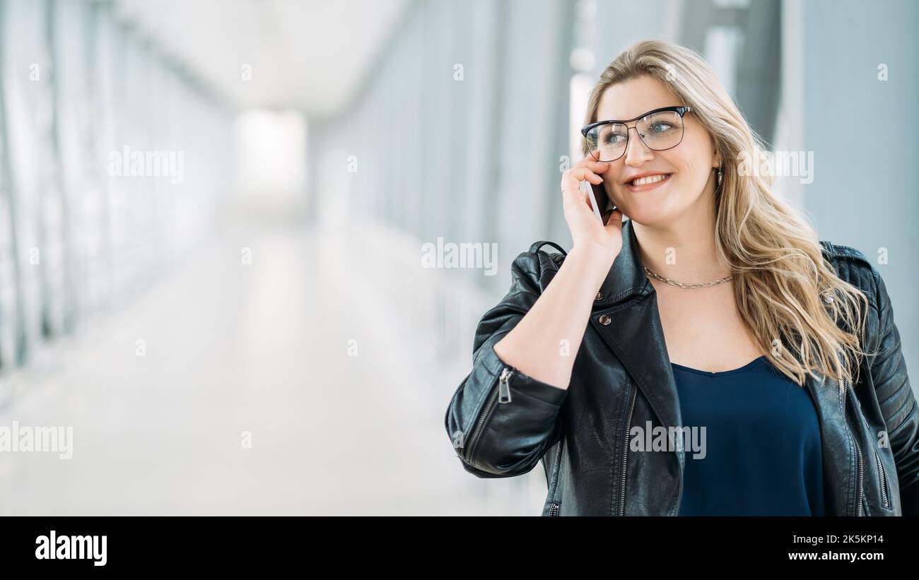 urban phone call mobile communication obese woman Stock Photo