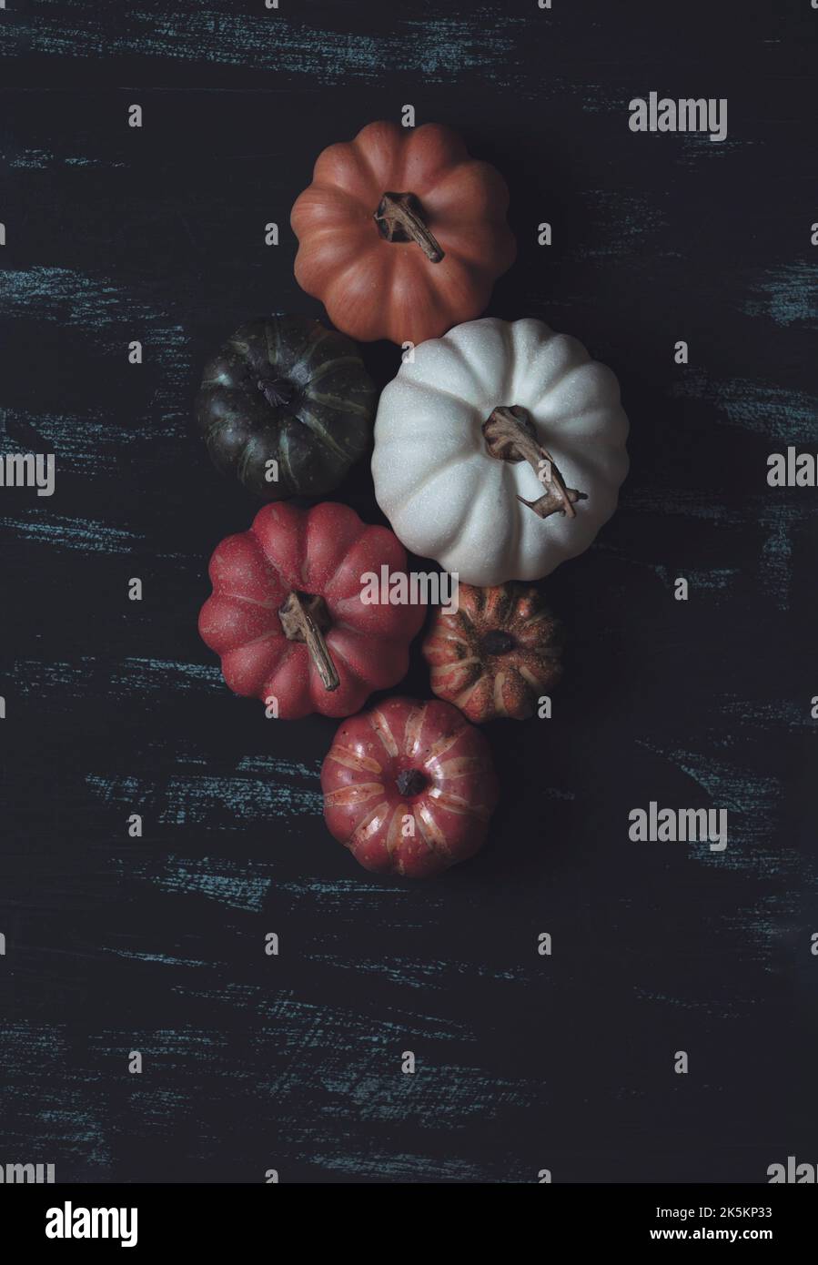 Pumpkin on table different size flat lay Stock Photo