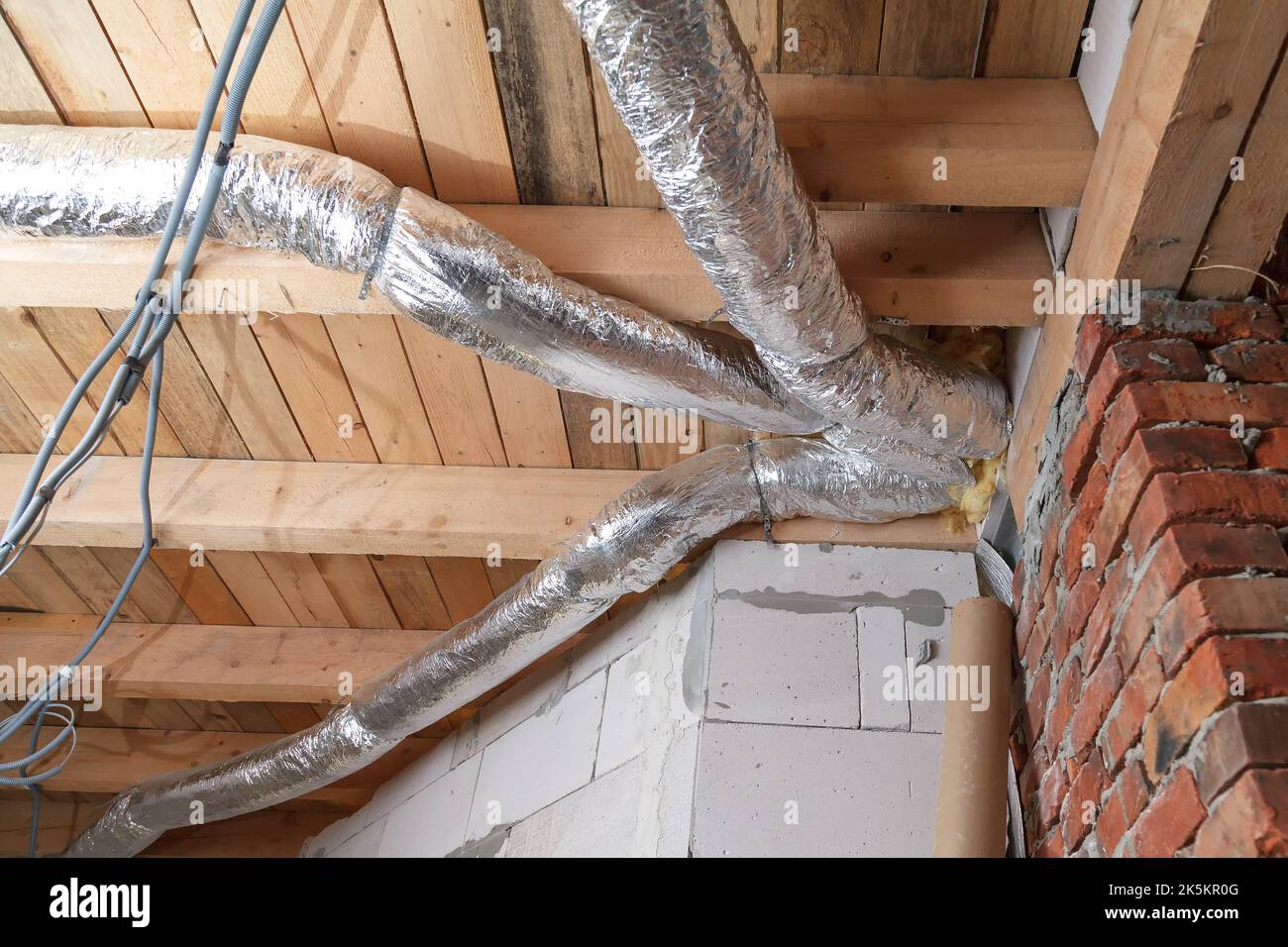 Installation of a pipe heating system. Heating at home with hot air