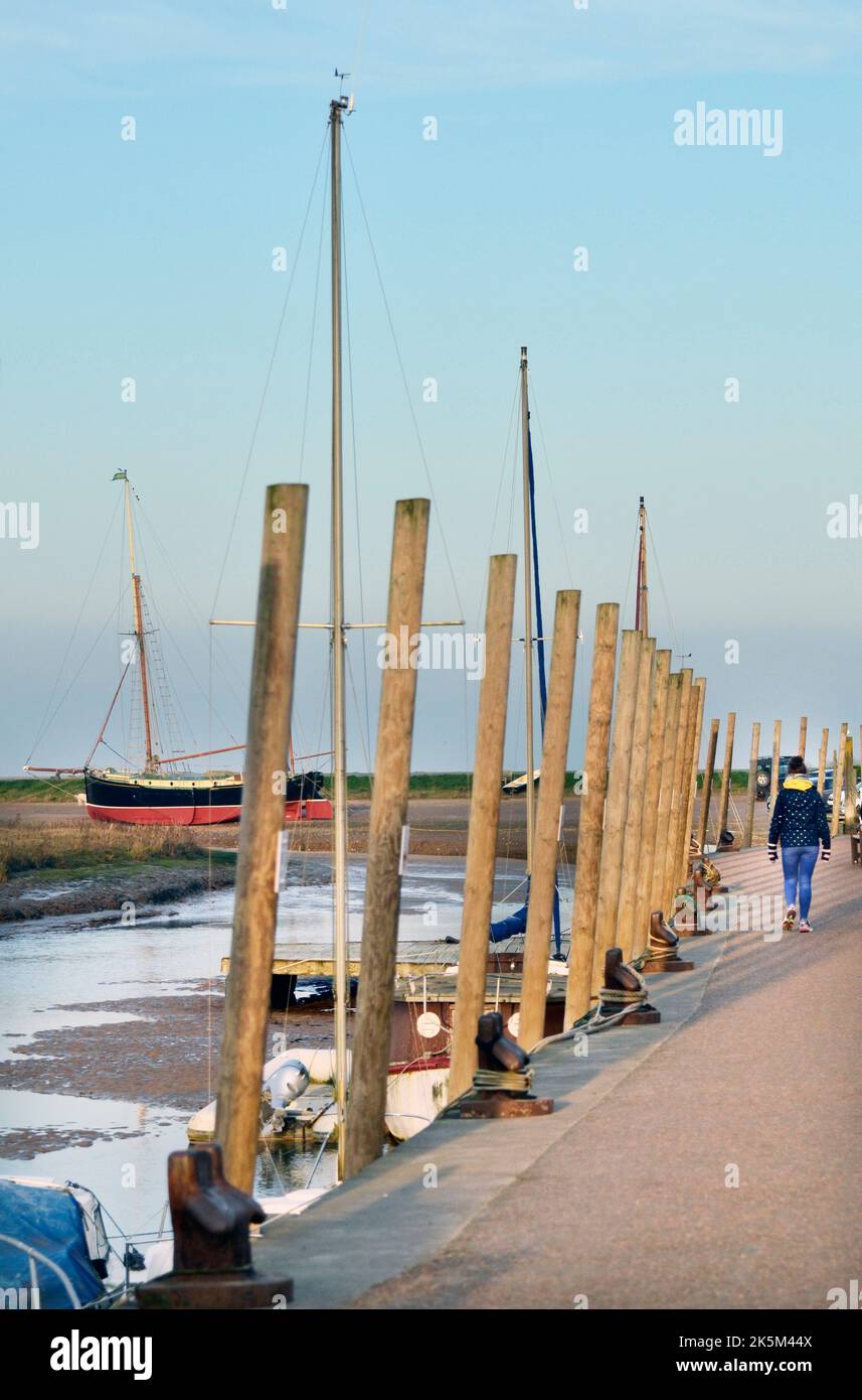 Woman walking boats in hi-res stock photography and images - Alamy