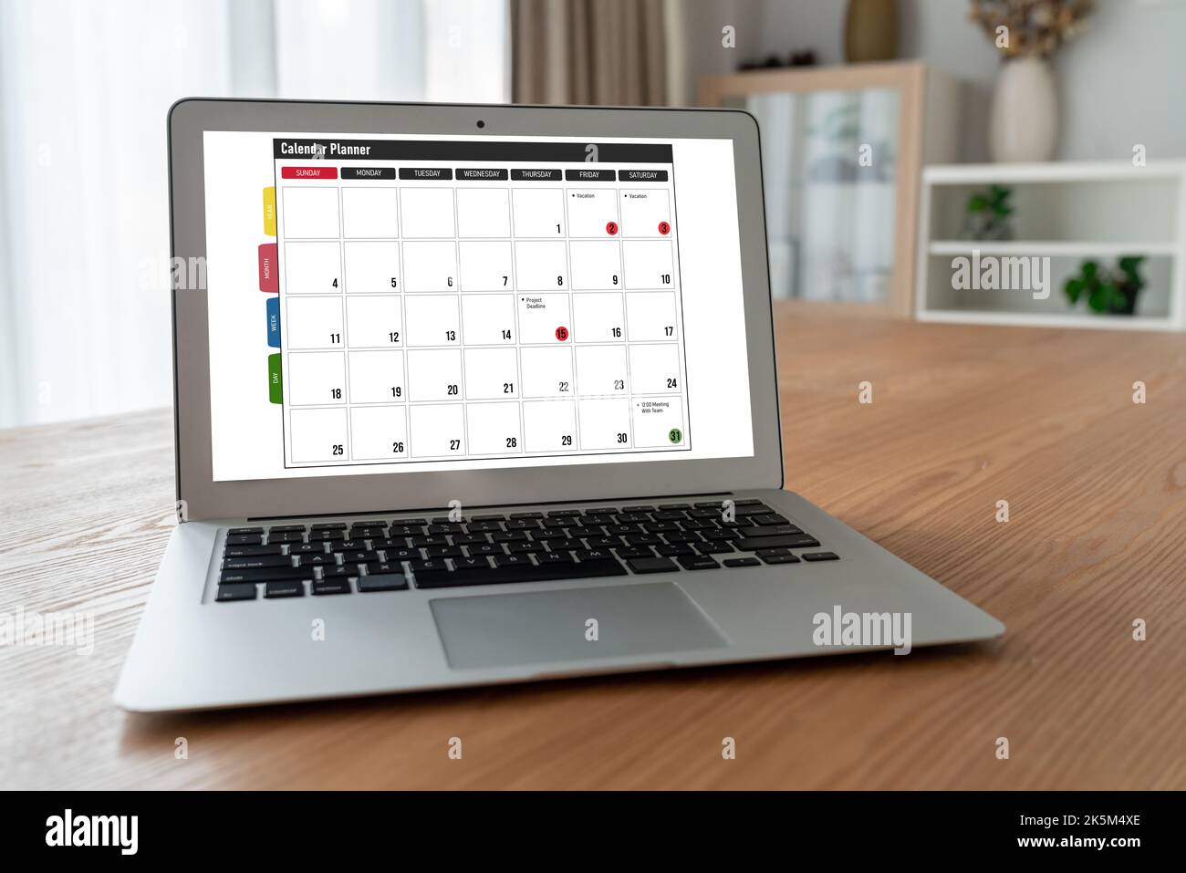 Calendar on computer software application for modish schedule planning for personal organizer and online business Stock Photo