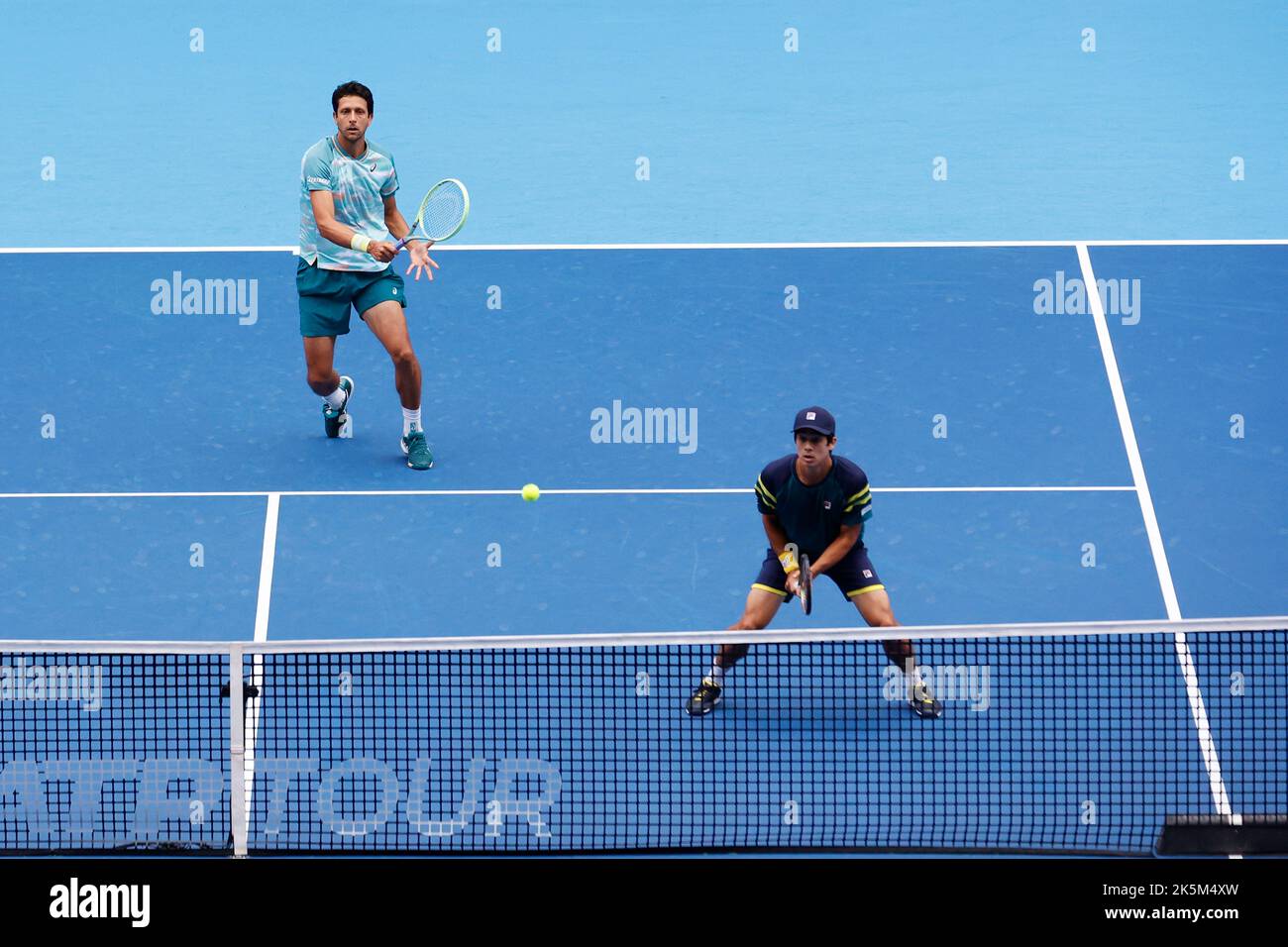 Tokyo, Japan. 9th Oct, 2022. (L to R) Marcelo MELO (BRA) and Mackenzie MCDONALD (USA) in action against Rafael MATOS (BRA) and David VEGA HERNANDEZ (ESP) during their Doubles Final match at the Rakuten Japan Open Tennis Championships 2022 at Ariake Coliseum. The tournament is held from October 1 to 9. M. McDonald and M. Melo won 6:4, 3:6, 10:4. (Credit Image: © Rodrigo Reyes Marin/ZUMA Press Wire) Credit: ZUMA Press, Inc./Alamy Live News Stock Photo