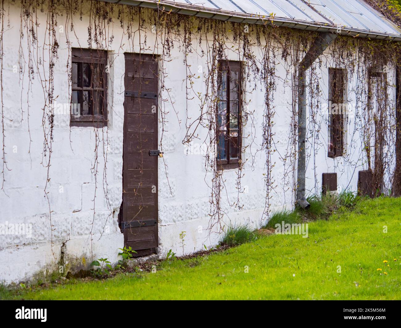 A white, brick house. Podlasie. Podlachia. Poland, Europe. The region is called Podlasko or Podlasze Stock Photo