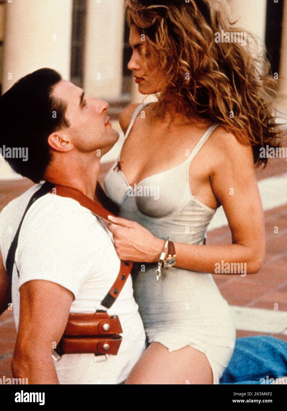 WILLIAM BALDWIN and CINDY CRAWFORD in FAIR GAME (1995), directed by