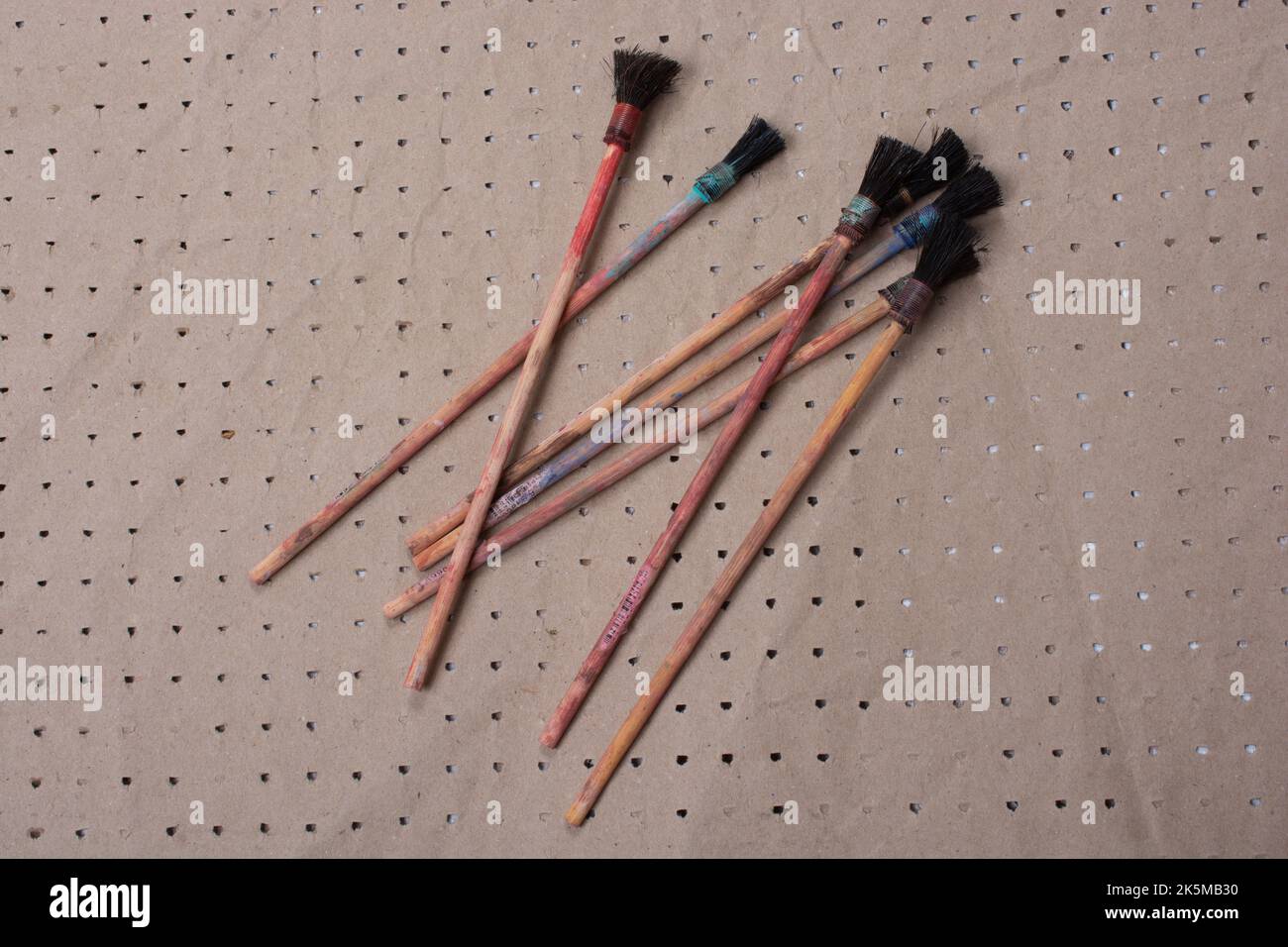Paint brushes on technique ebru art on paper background Stock Photo
