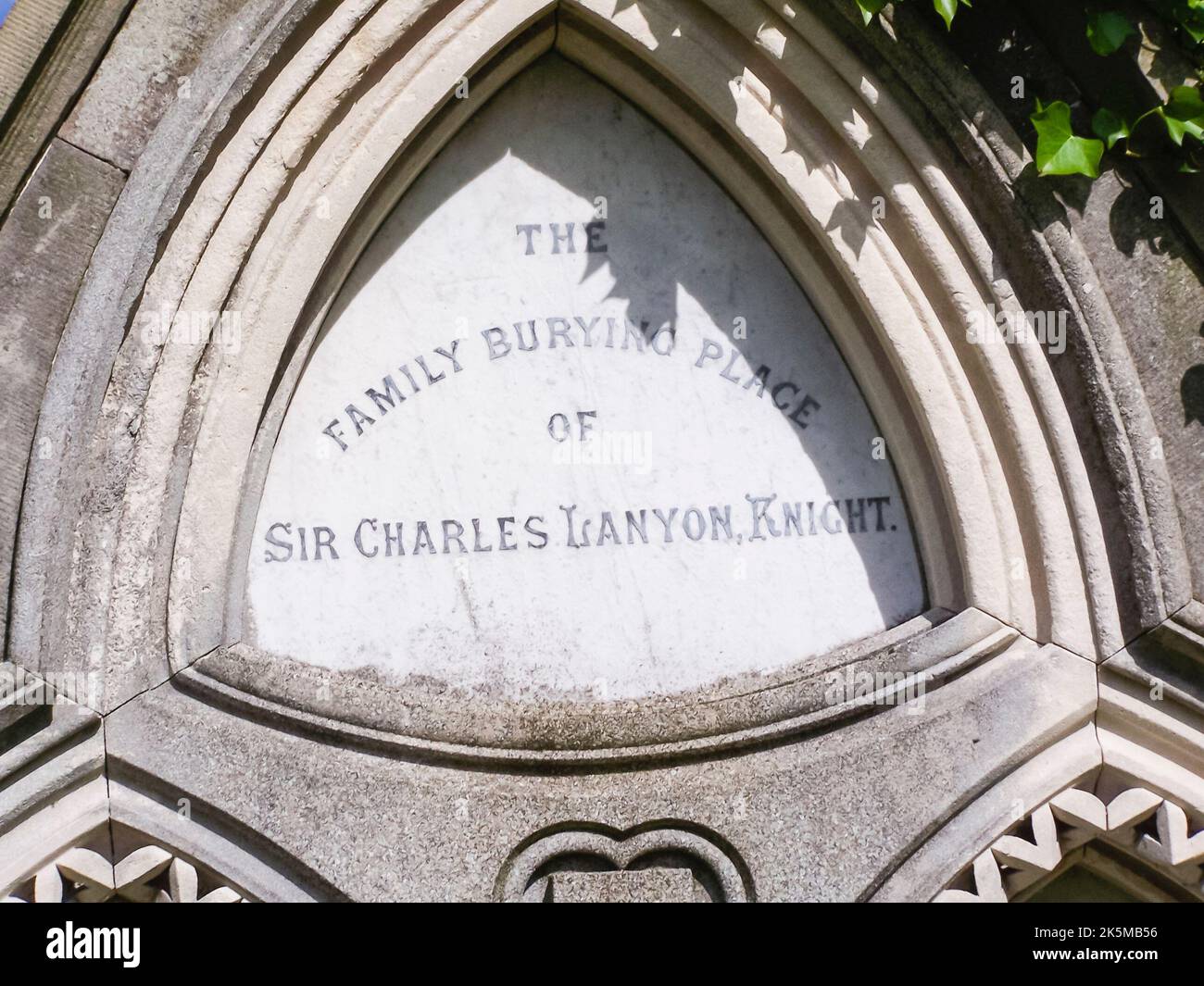 Gravestone of the 19th century architect Charles Lanyon, who was responsible for hundreds of buildings, as well as the Antrim Coast Road, Northern Ireland Stock Photo