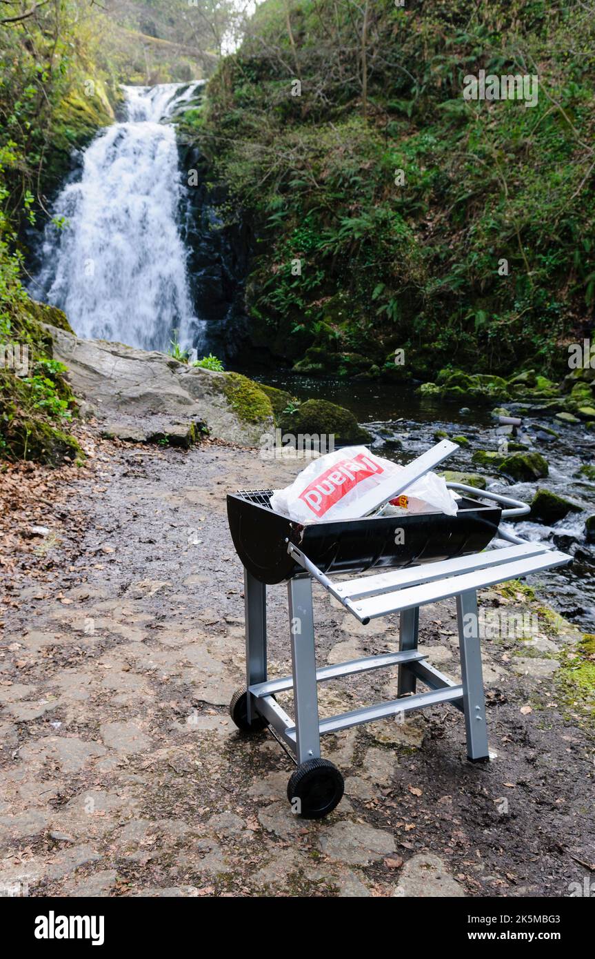 Wheeled barbecue abandoned at Glenoe waterfall beauty spot, Northern Ireland, United Kingdom, UK Stock Photo