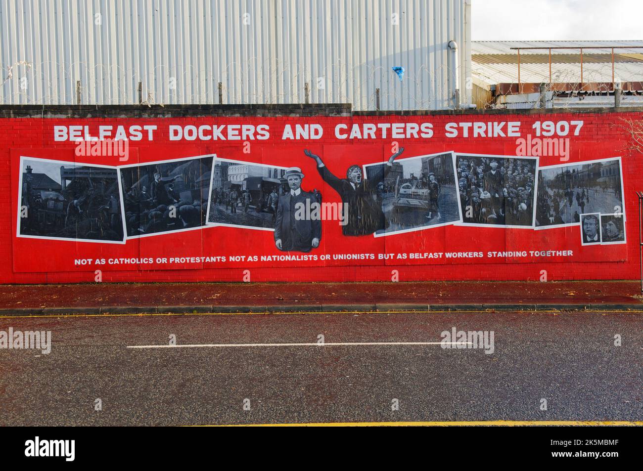 Mural on a wall off Belfast's Falls Road commemorating the Belfast dockers and carters strike 1907 Stock Photo