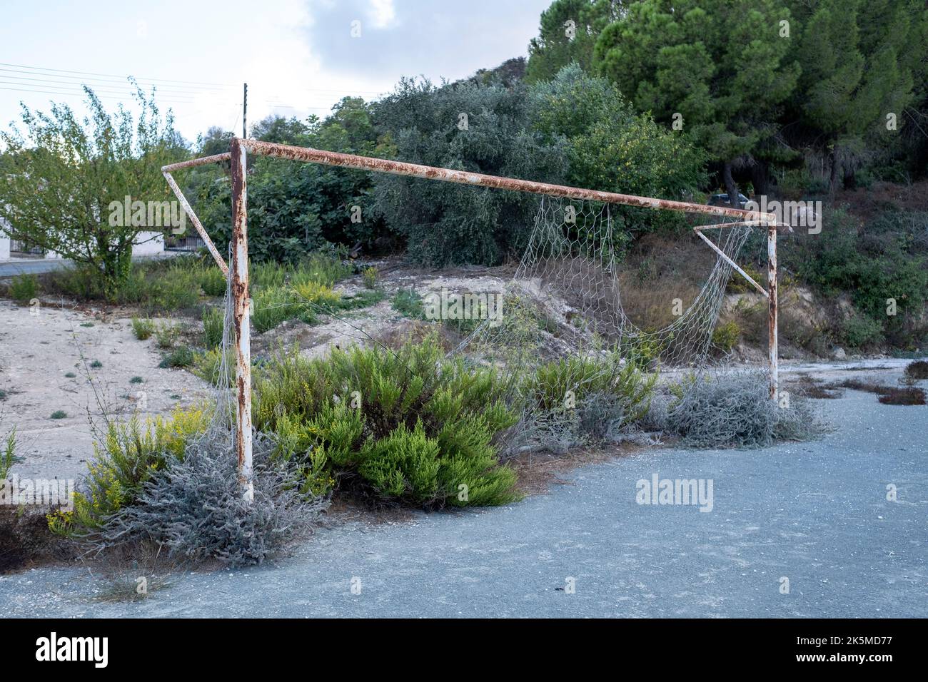 Overgrown football goalposts, Pano Theletra Village, Cyprus. Stock Photo
