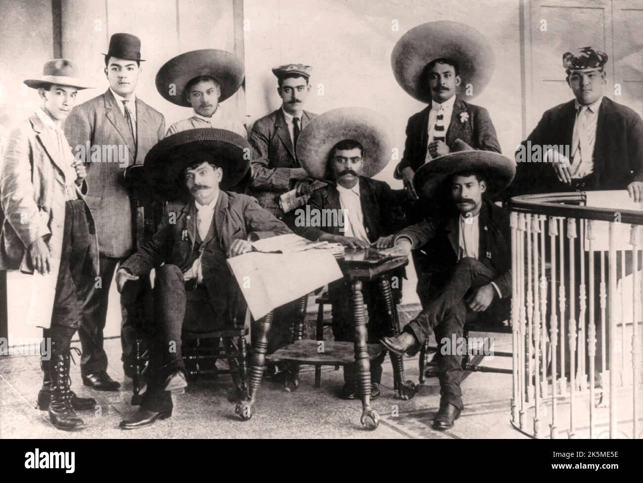 Emiliano Zapata Salazar (1879-1919), leader of the Mexican Revolution (1910-1920). From left to right: Tirso Espinosa, Gildardo Magaña, M. Mejía, Abram Martínez, Jesús Jauregui and Rodolfo Magaña; seated: Eufemio Zapata (Emiliano's brother), Emiliano Zapata and Próculo Capistrán. They are at Hotel Coliseo, Mexico City on June 24, 1911 Stock Photo