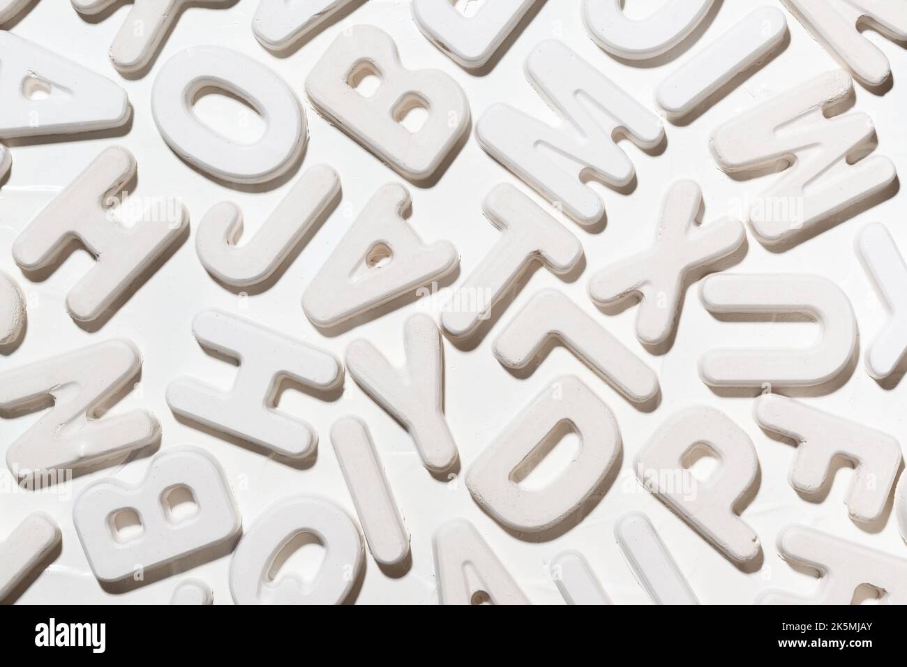 White random Latin letters, may be used as background Stock Photo