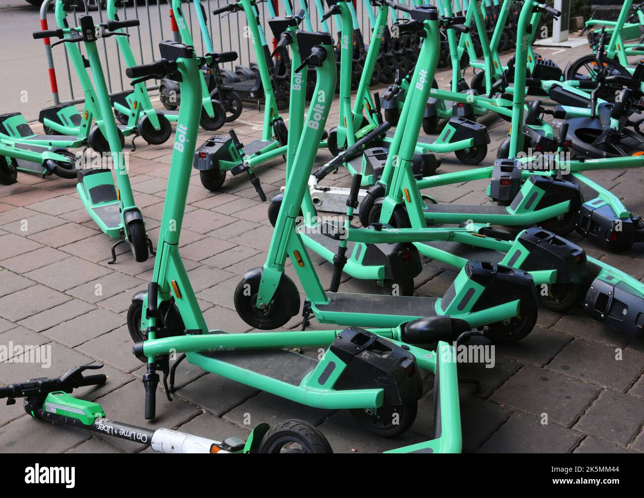 Cracow. Krakow. Poland. Escooters standing on the sidewalk waiting for