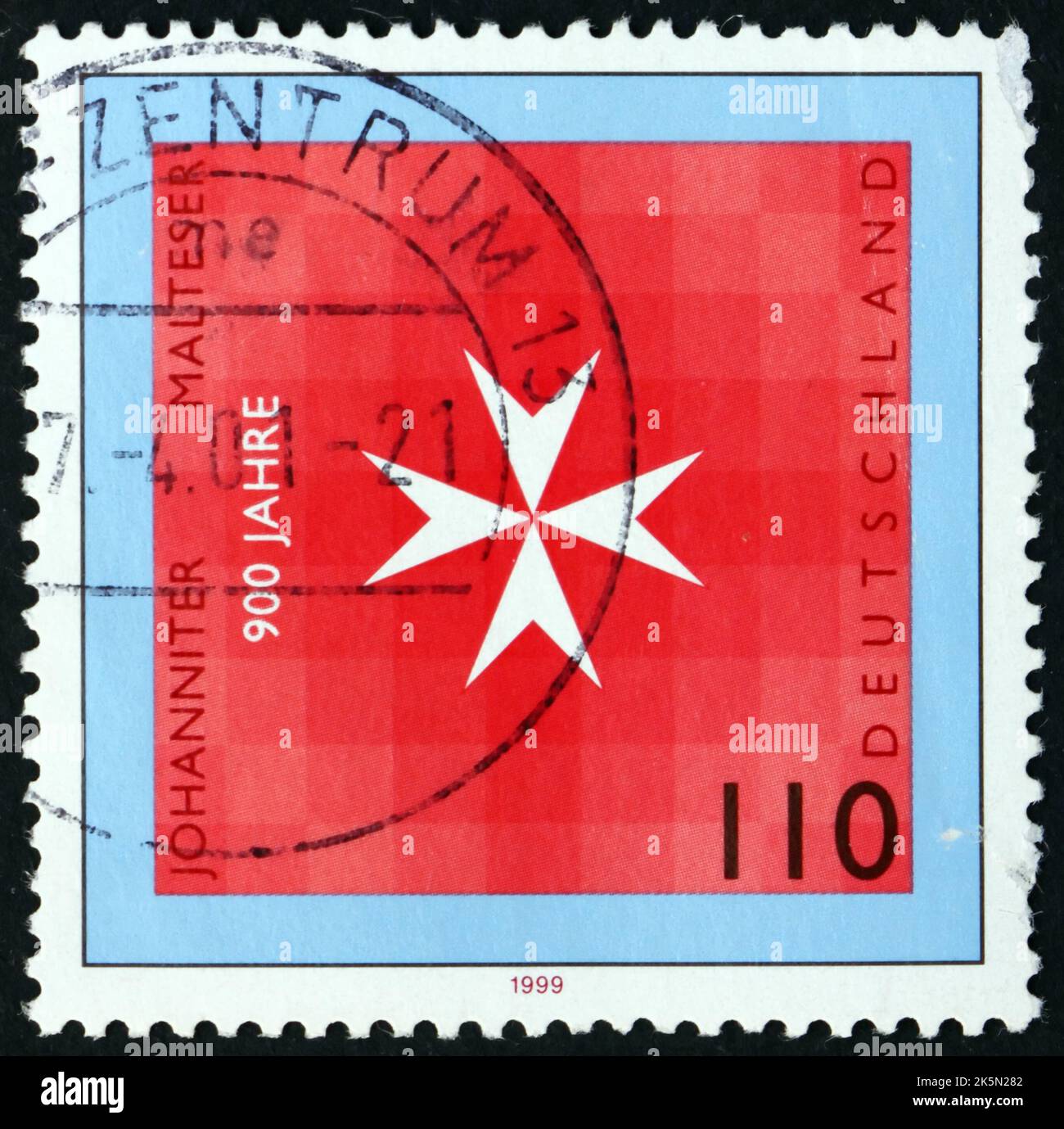 GERMANY - CIRCA 1999: a stamp printed in Germany shows Maltese cross, Knights of St. John of Jerusalem and Knights of Malta, 900th Anniversary, circa Stock Photo