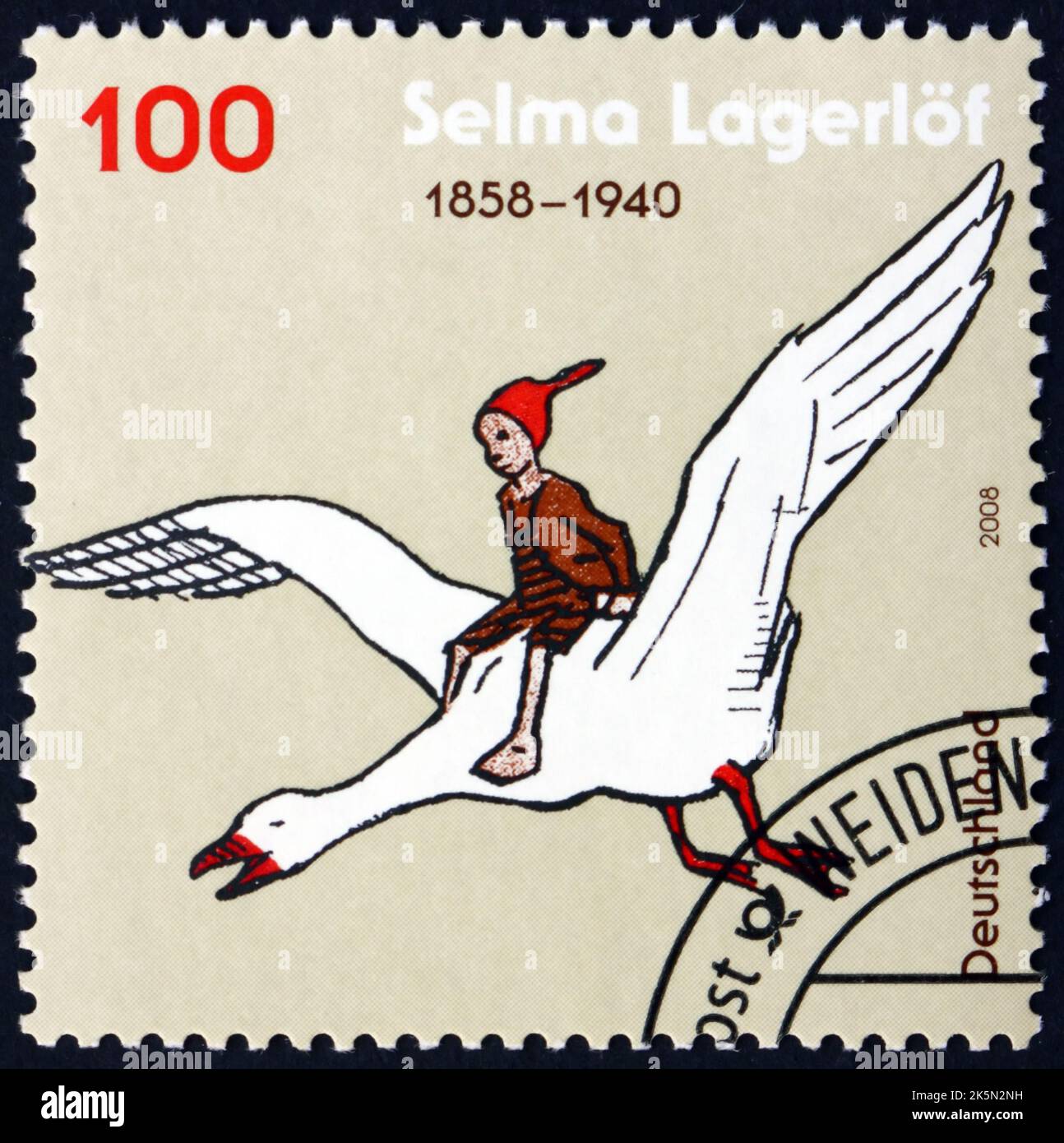 GERMANY - CIRCA 2008: a stamp printed in Germany shows Nils Holgersson on goose (from the wonderful adventures of Nils by Selma Lagerlof), 150th birth Stock Photo