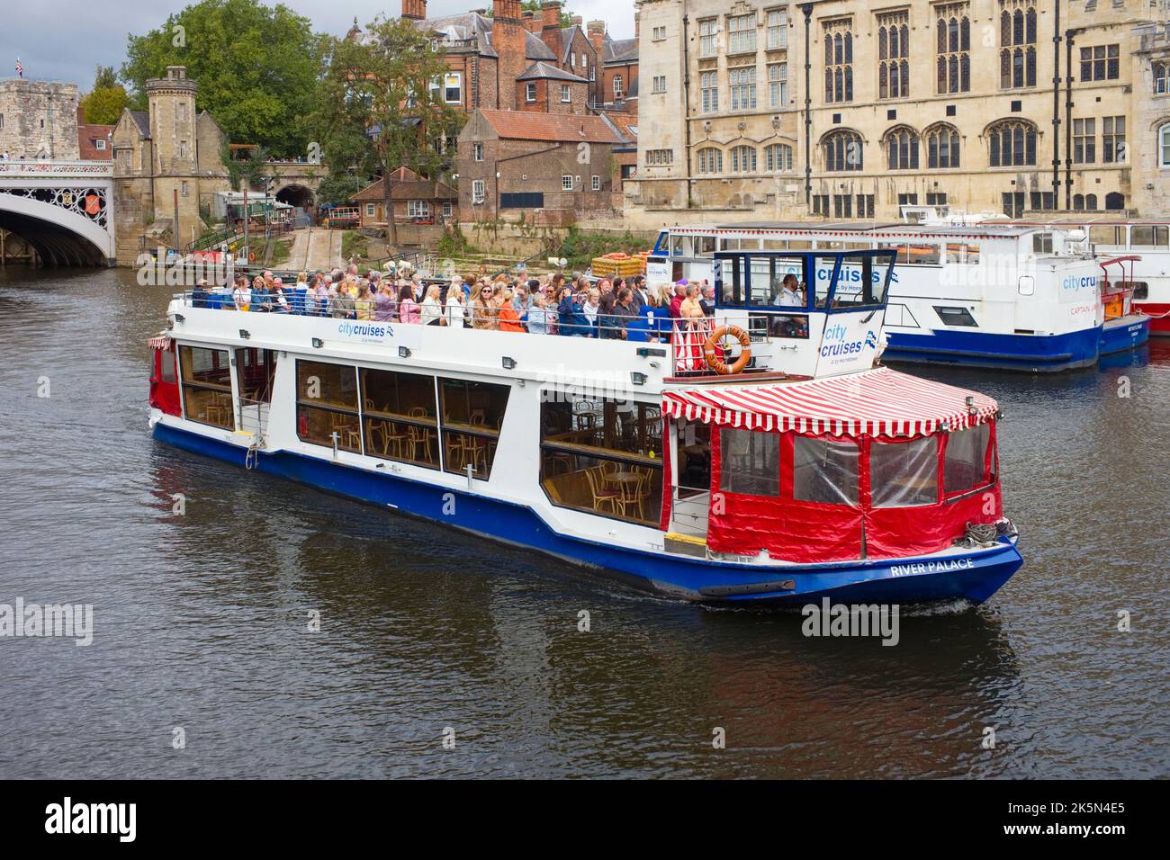 City Cruises boat River Palace with the upper deck full of tourists on a boat trip down the river Ouse in York Stock Photo