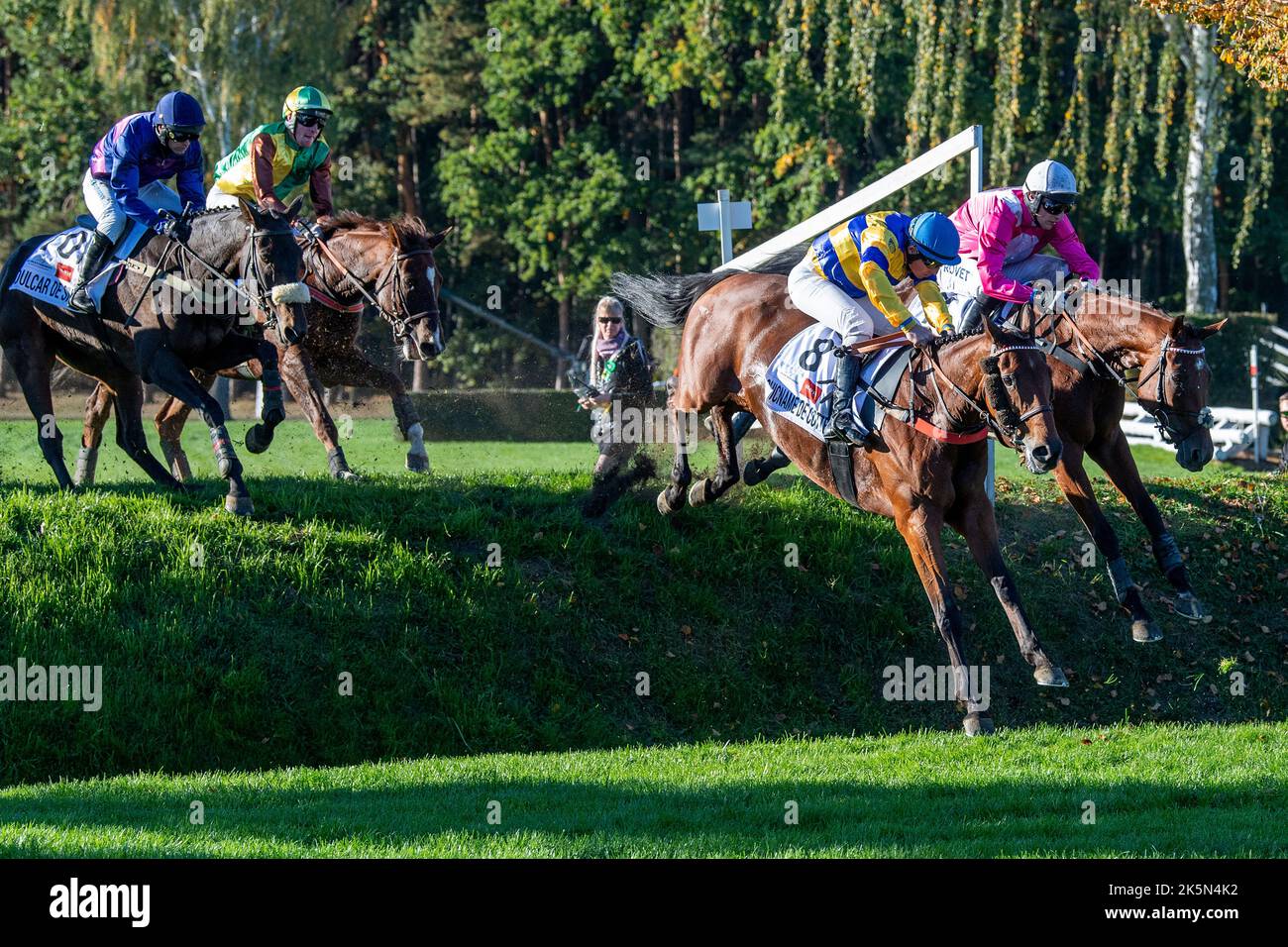 (R-L) Jockeys Lukas Matusky with horse Mr Spex and Ludovic Solignac with horse Chicname De Cotte compete during the 132nd Grand Pardubice Steeplechase in Pardubice, Czech Republic, October 9, 2022. (CTK Photo/David Tanecek) Stock Photo