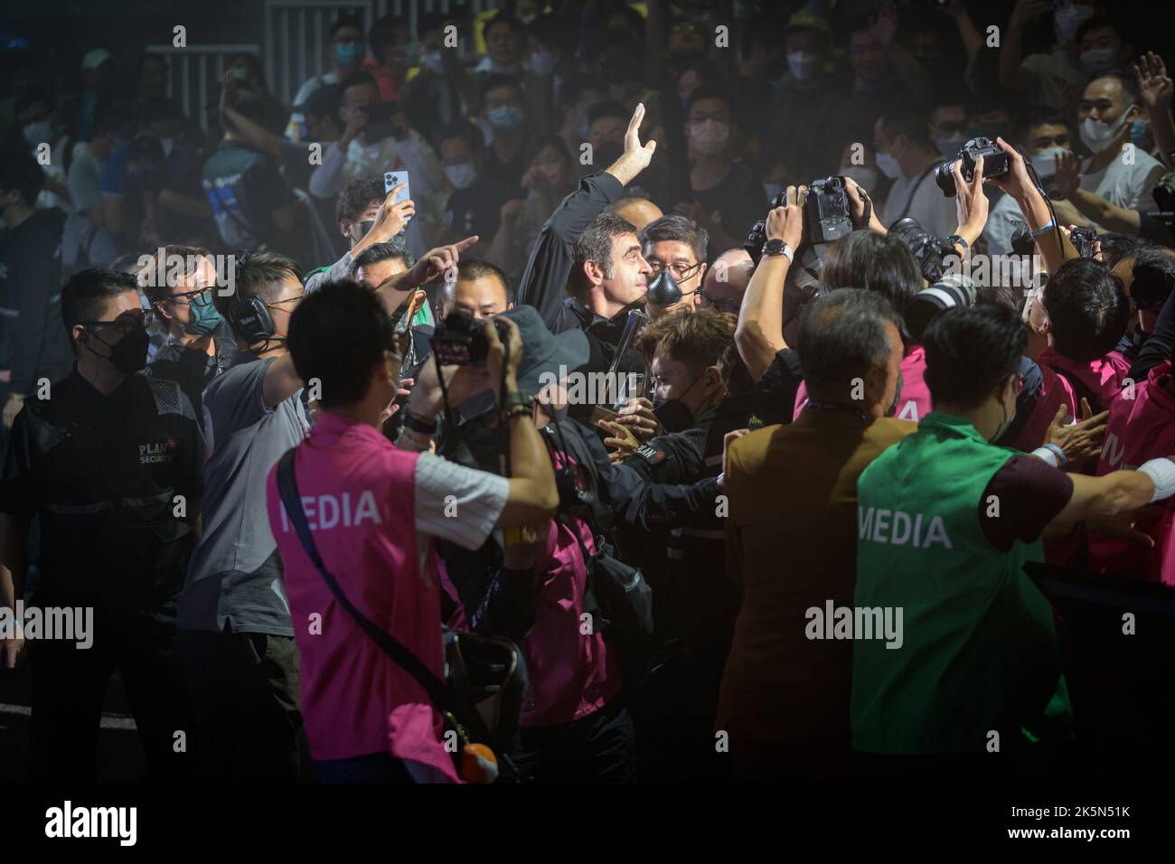 Hong Kong, China. 09th Oct, 2022. Ronnie O'Sullivan and Marco Fu. Ronnie O'Sullivan wins and is mobbed by fans and press.World No1 Ronnie O'Sullivan from England takes on local Hong Kong champion Marco Fu in the final of the Hong Kong Masters Snooker 2022. Alamy Live Sport/Jayne Russell Credit: Jayne Russell/Alamy Live News Stock Photo