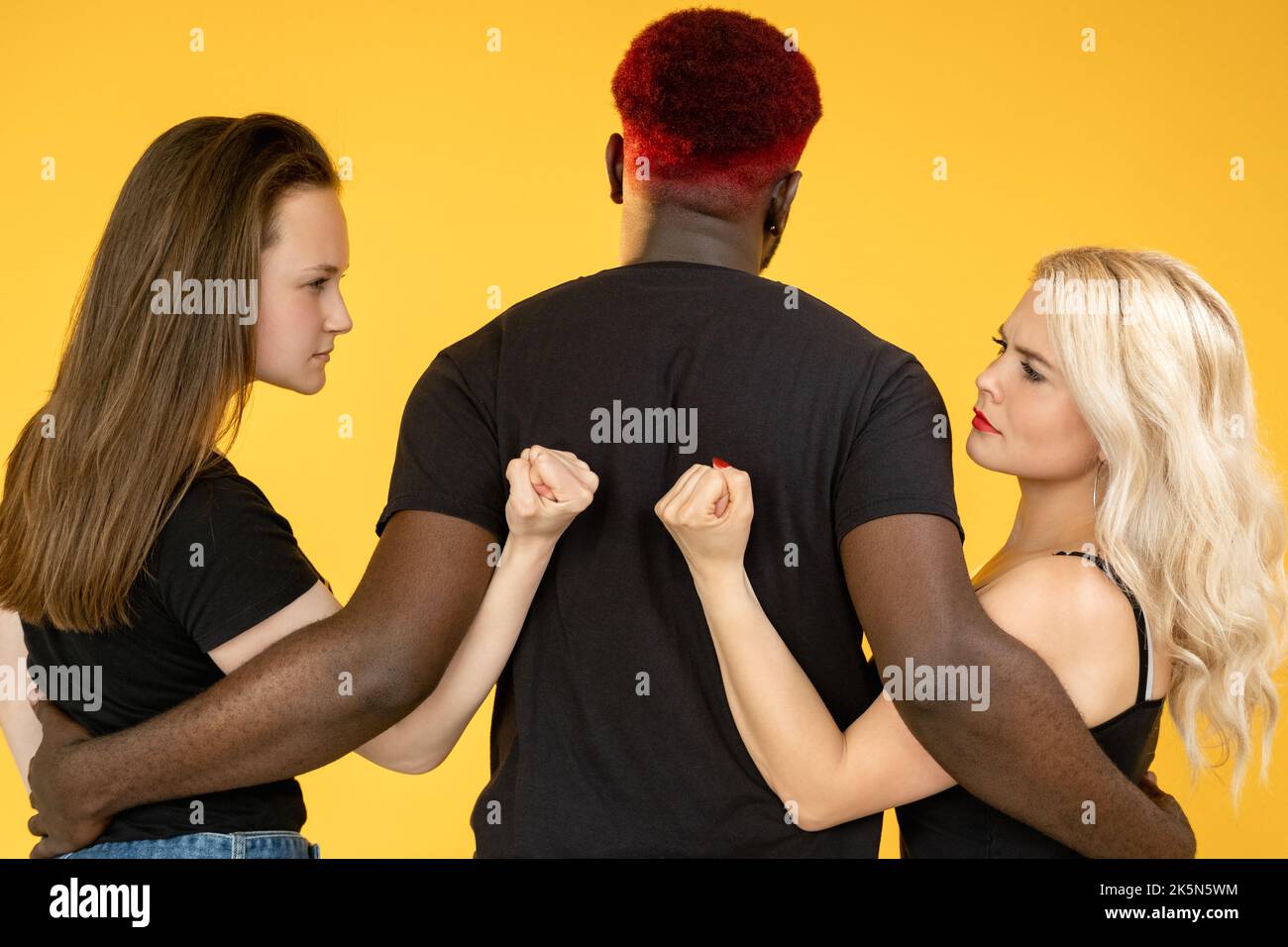 Two women man jealousy hi-res stock photography and images picture
