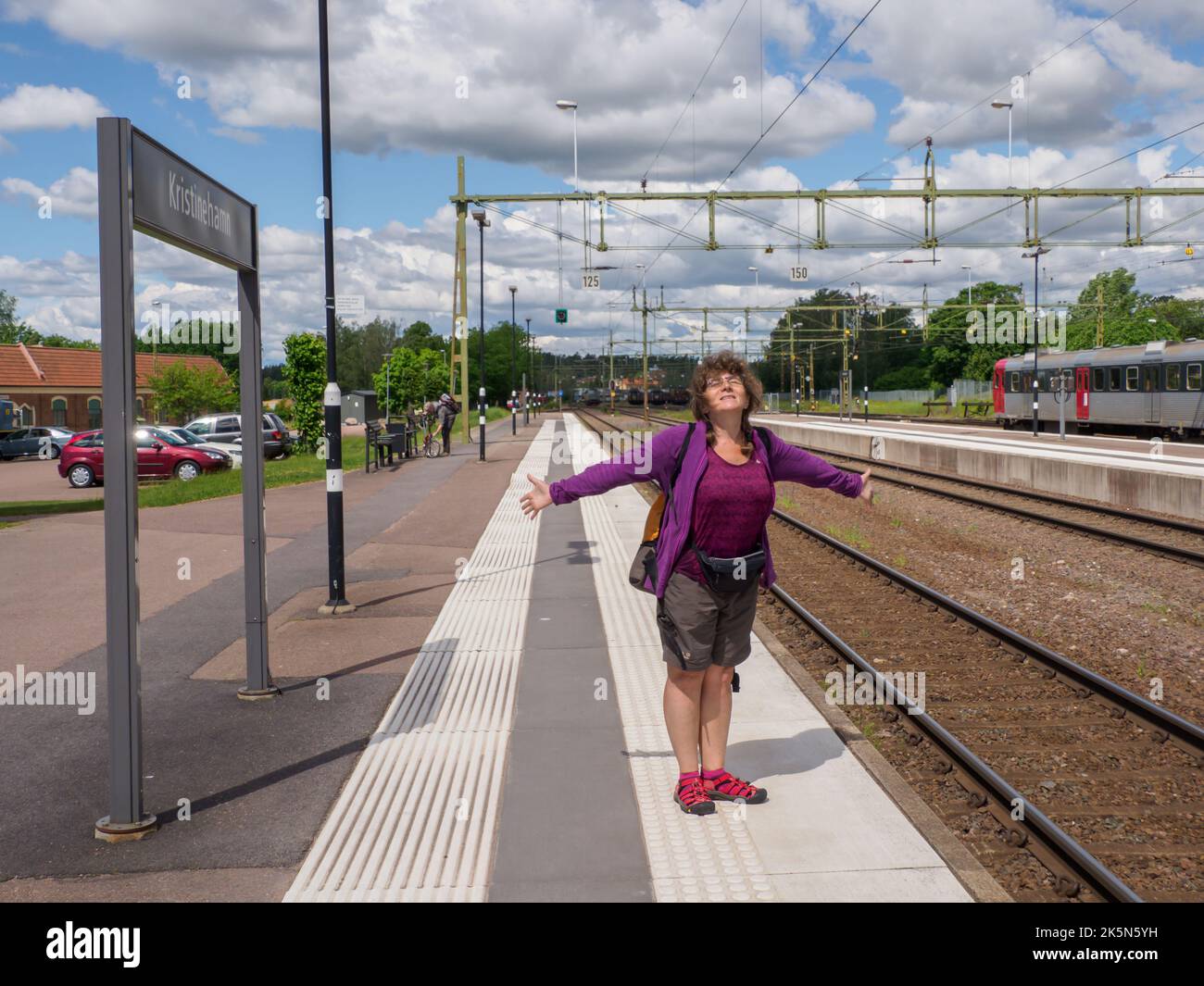 Kristinehamn, Sweden -June, 2021: Tourist on platform for the train station. Scandinavia. North Europe. Stock Photo