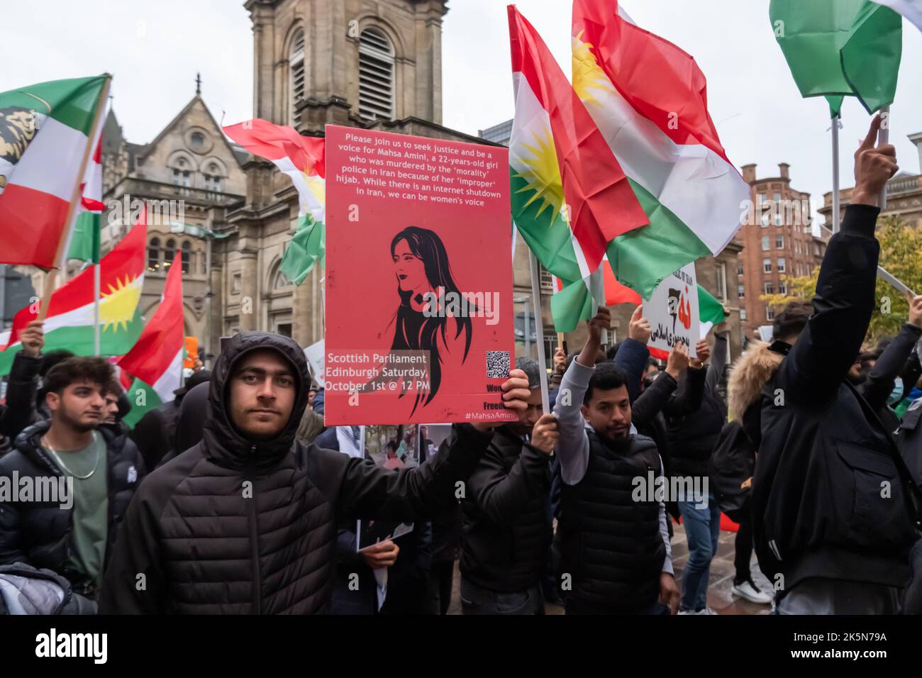 Glasgow, Scotland, UK. 9th October 2022: Campaigners march through the streets and gather in George Square to protest against human rights violations by the regime in Iran. Protestors wanted to show their support for Mahsa Amini, who was detained by the Morality Police and died after being arrested for wrongly wearing the hijab. Credit: Skully/Alamy Live News Stock Photo