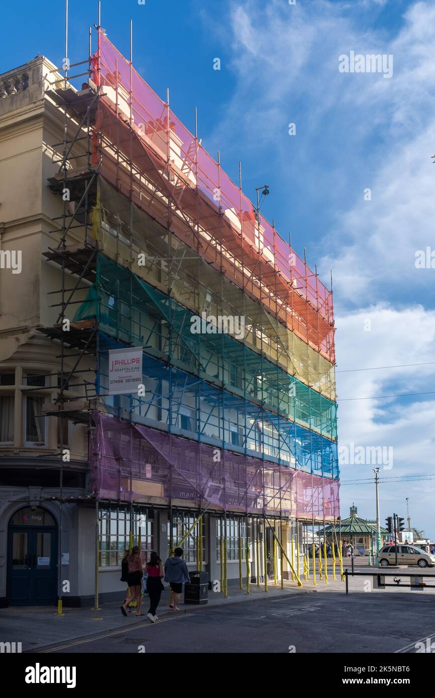 Scaffolding cover in pride colours, Brighton, UK Stock Photo