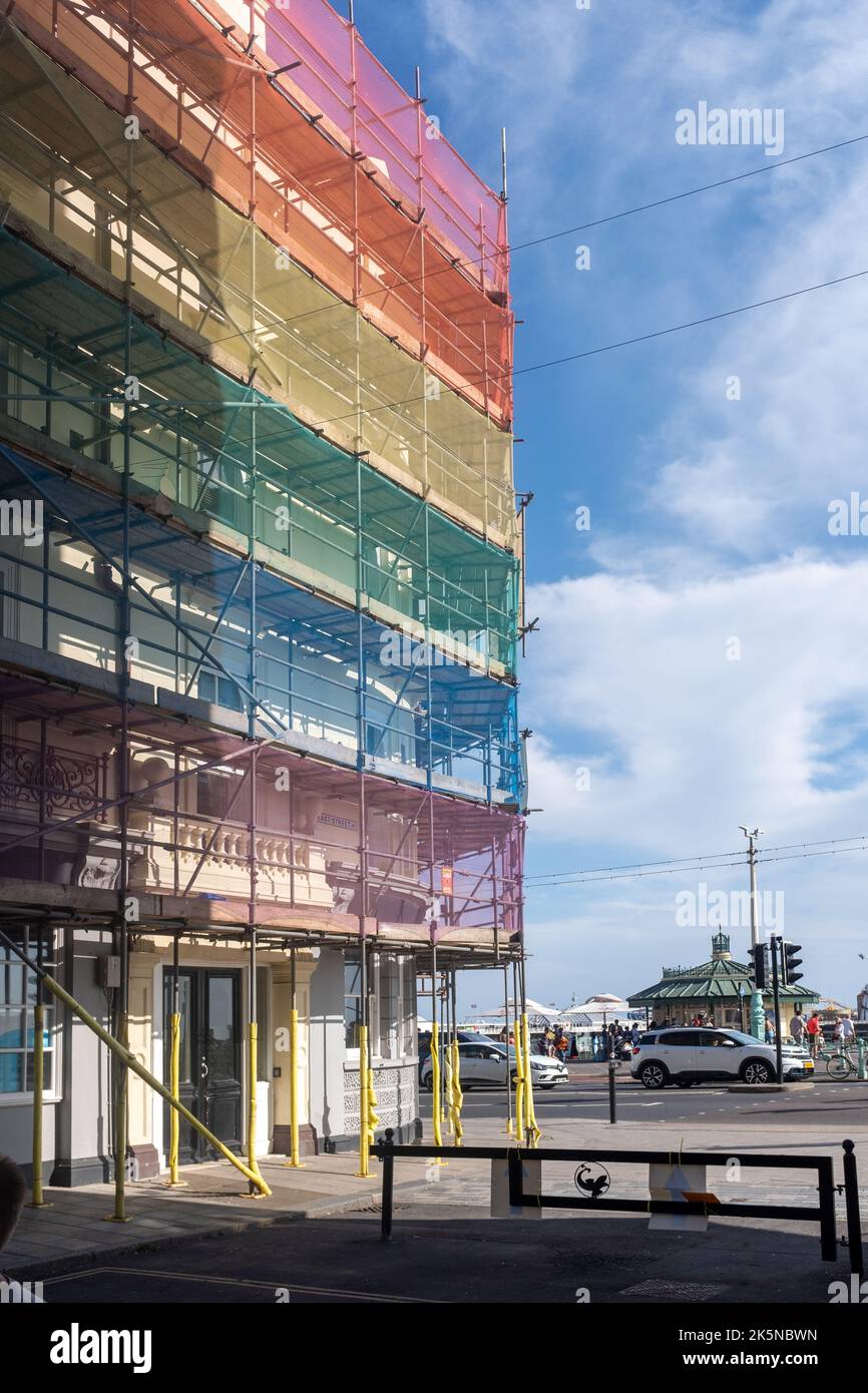 Scaffolding cover in pride colours, Brighton, UK Stock Photo