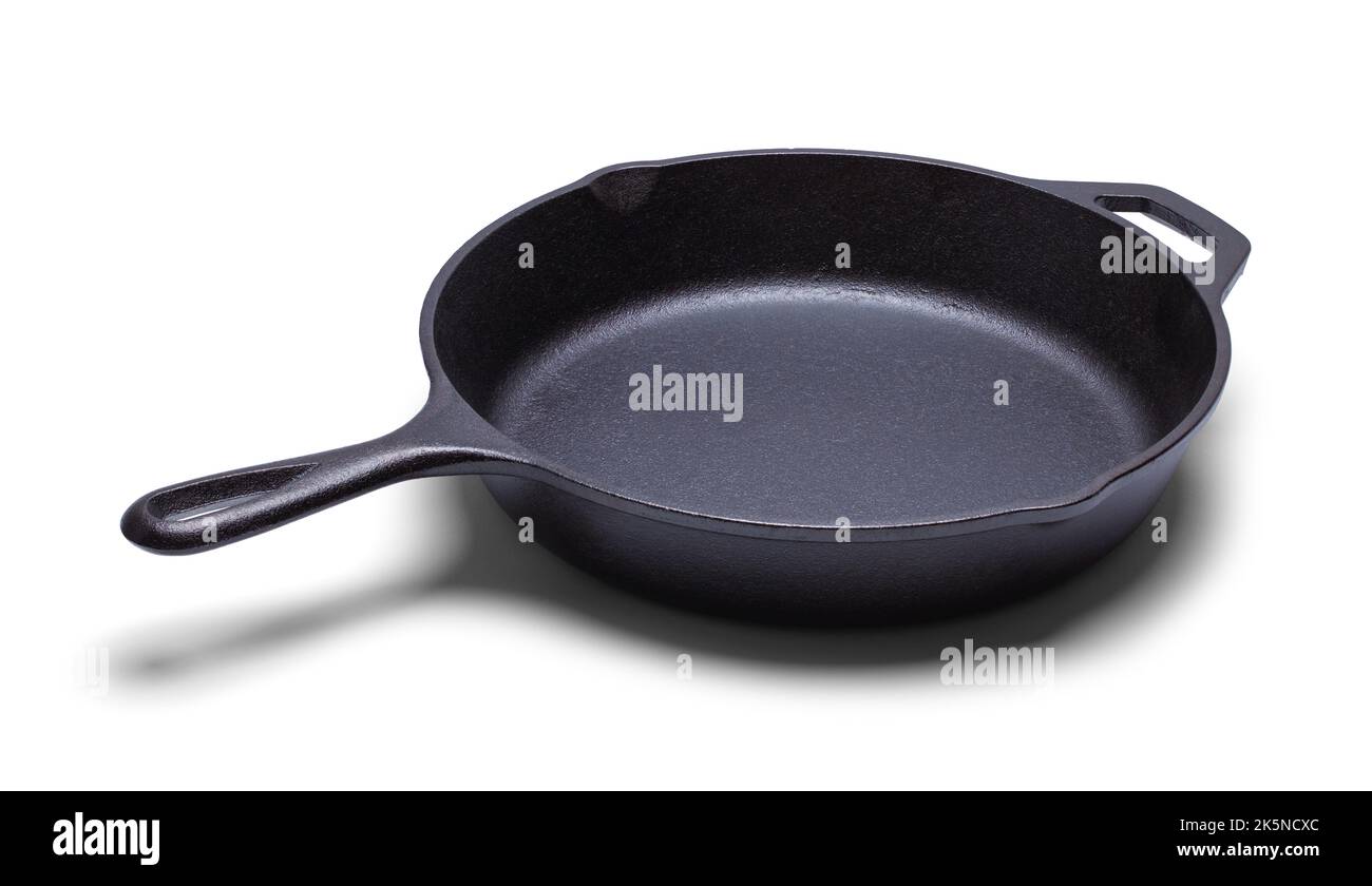 Cast Iron Cooking Skillet Pan Top View Cut out on White. Stock Photo