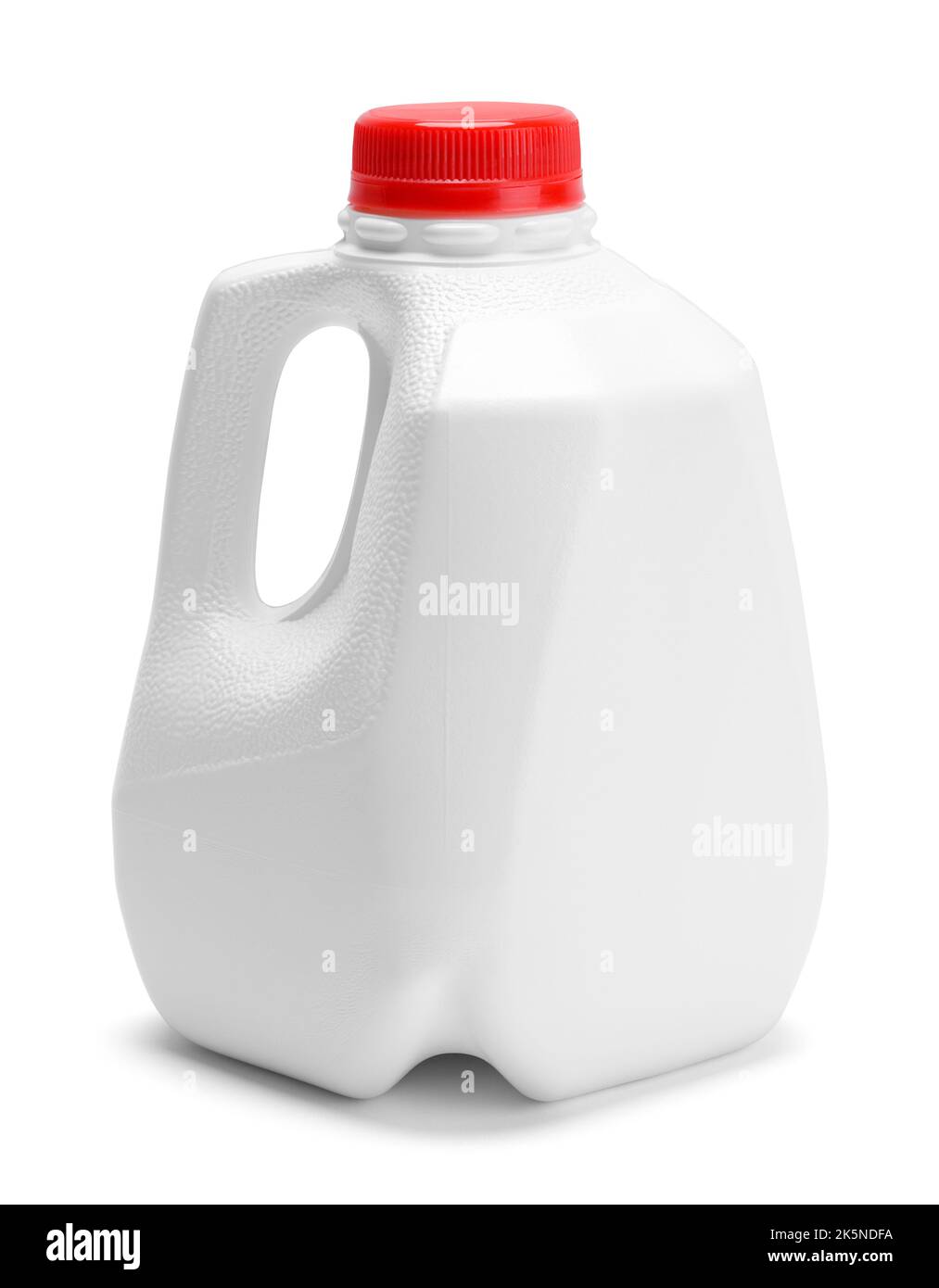 Small Milk Jug Cut Out on White. Stock Photo