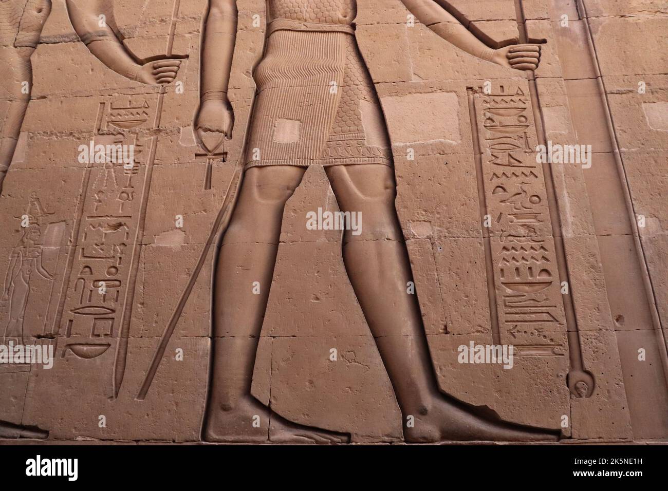 Pharaonic figures and hieroglyphics carved at walls of Kom Ombo temple Stock Photo