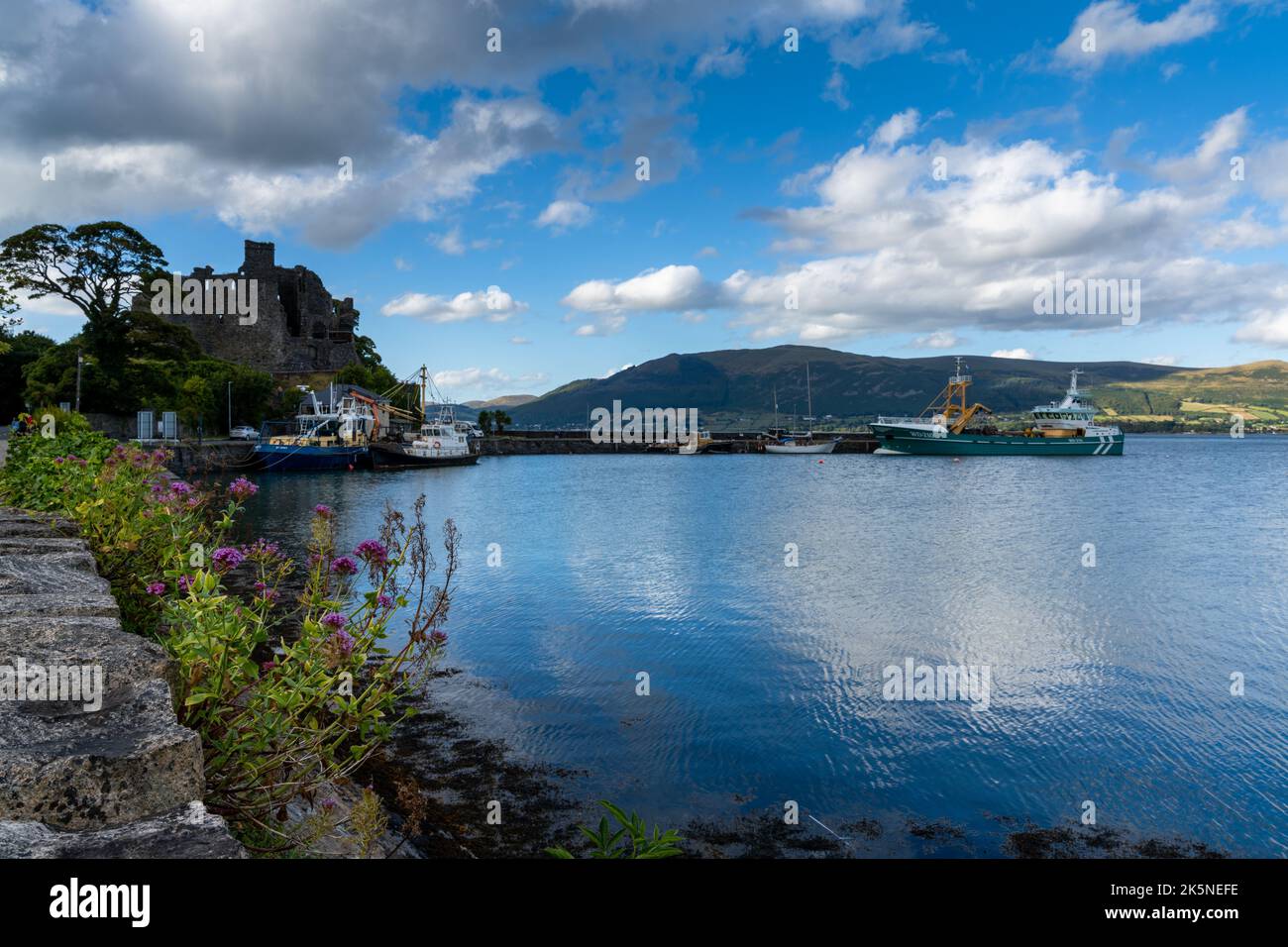 Carlingford, Ireland - 21 August, 2022: view of the harbor of and castle of Carlingford on the Cooley Peninsula Stock Photo