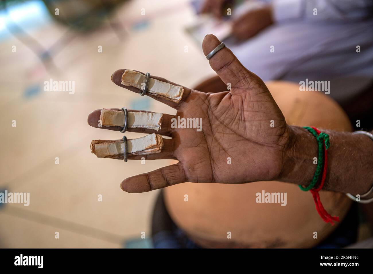 Hand of a drum player, Lahore, Pakistan Stock Photo