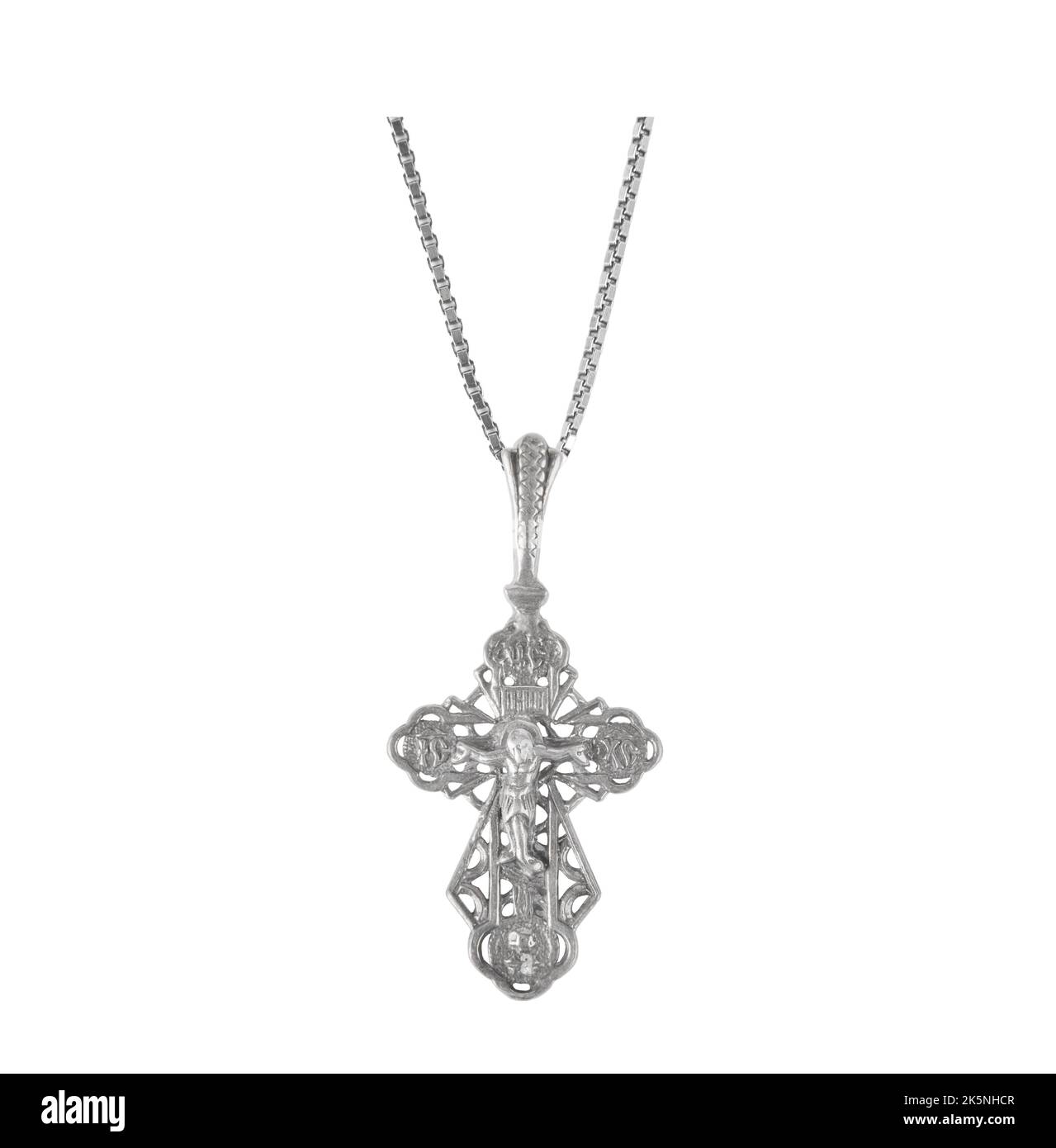 Silver crucifix necklace cross isolated on white background Stock Photo