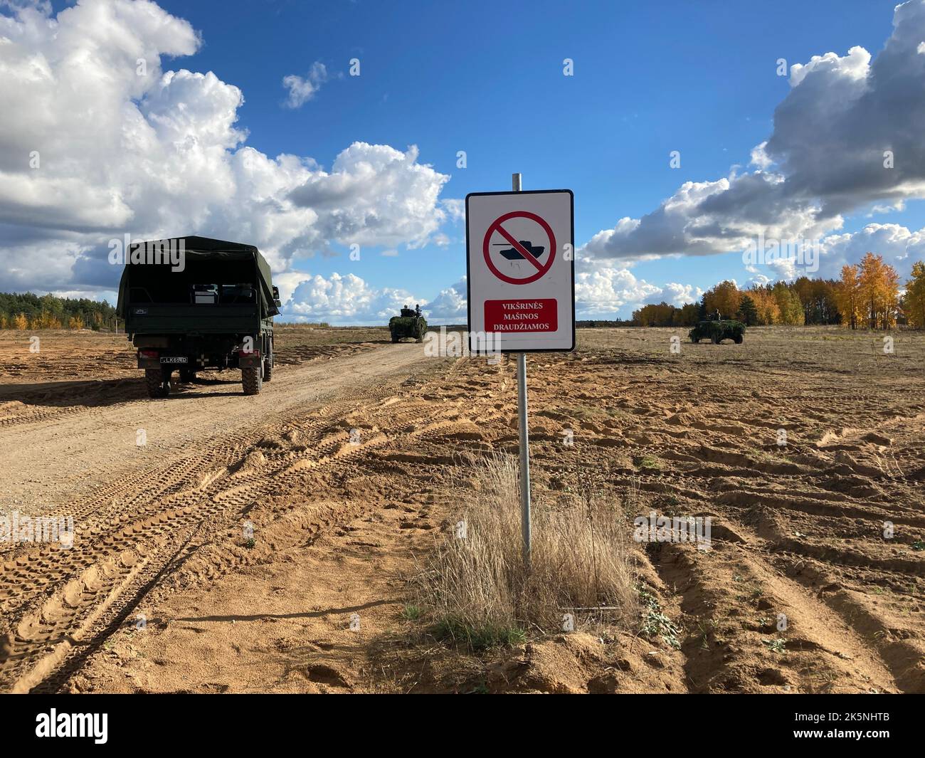 Gaiziunai, Germany. 09th Oct, 2022. Military vehicles drive during an ...