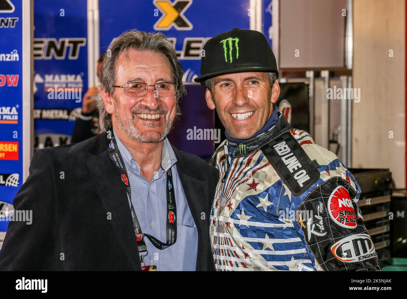 Speedway photographer Mike Patrick (left) with speedway world champion Greg Hancock as the 2013 British Speedway Grand Prix Stock Photo