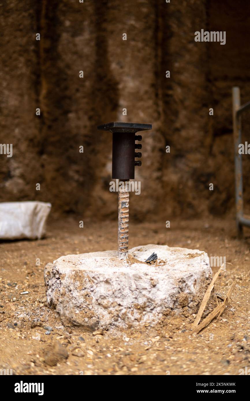 A closeup Reinforcement coupler on concrete pile tension bar in